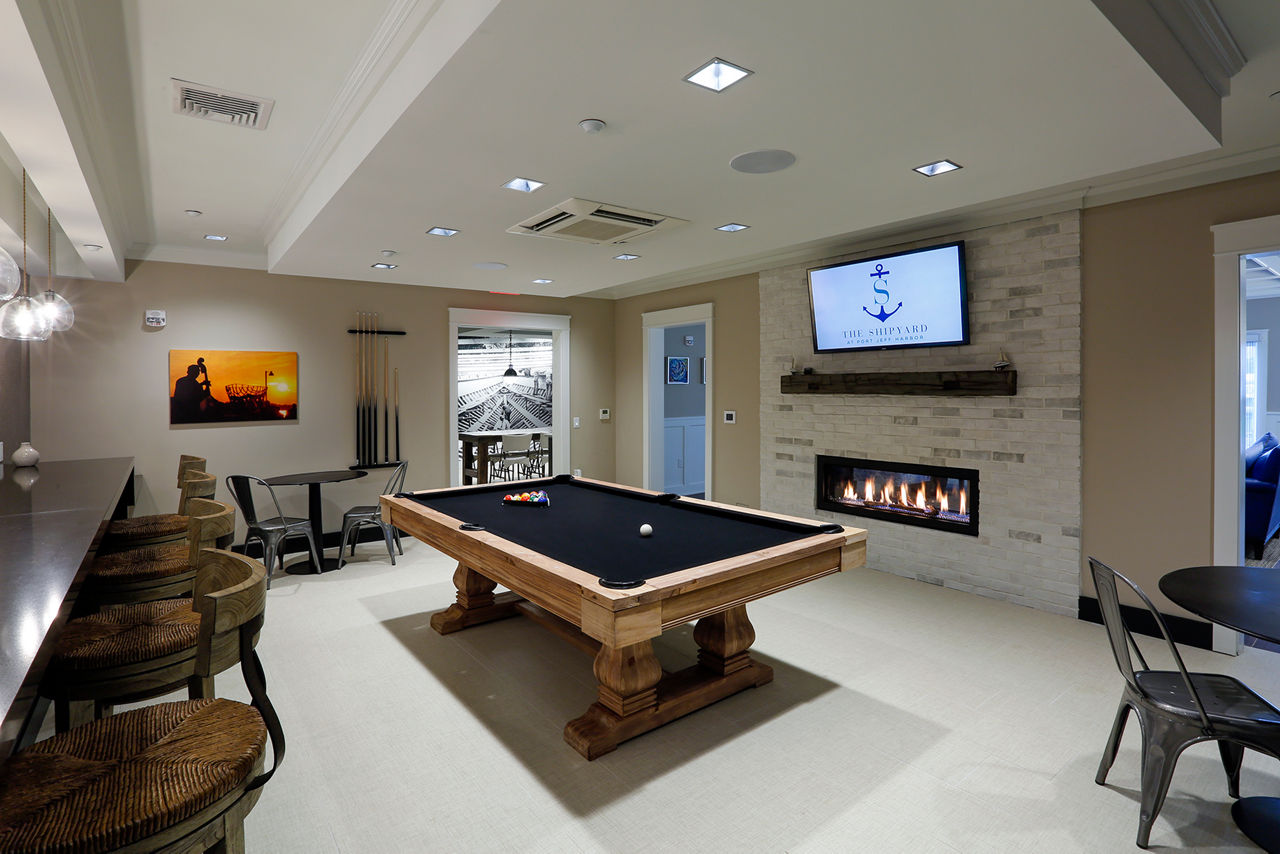 Billiards room featuring modern decor at The Shipyard at Port Jefferson Harbor Apartments