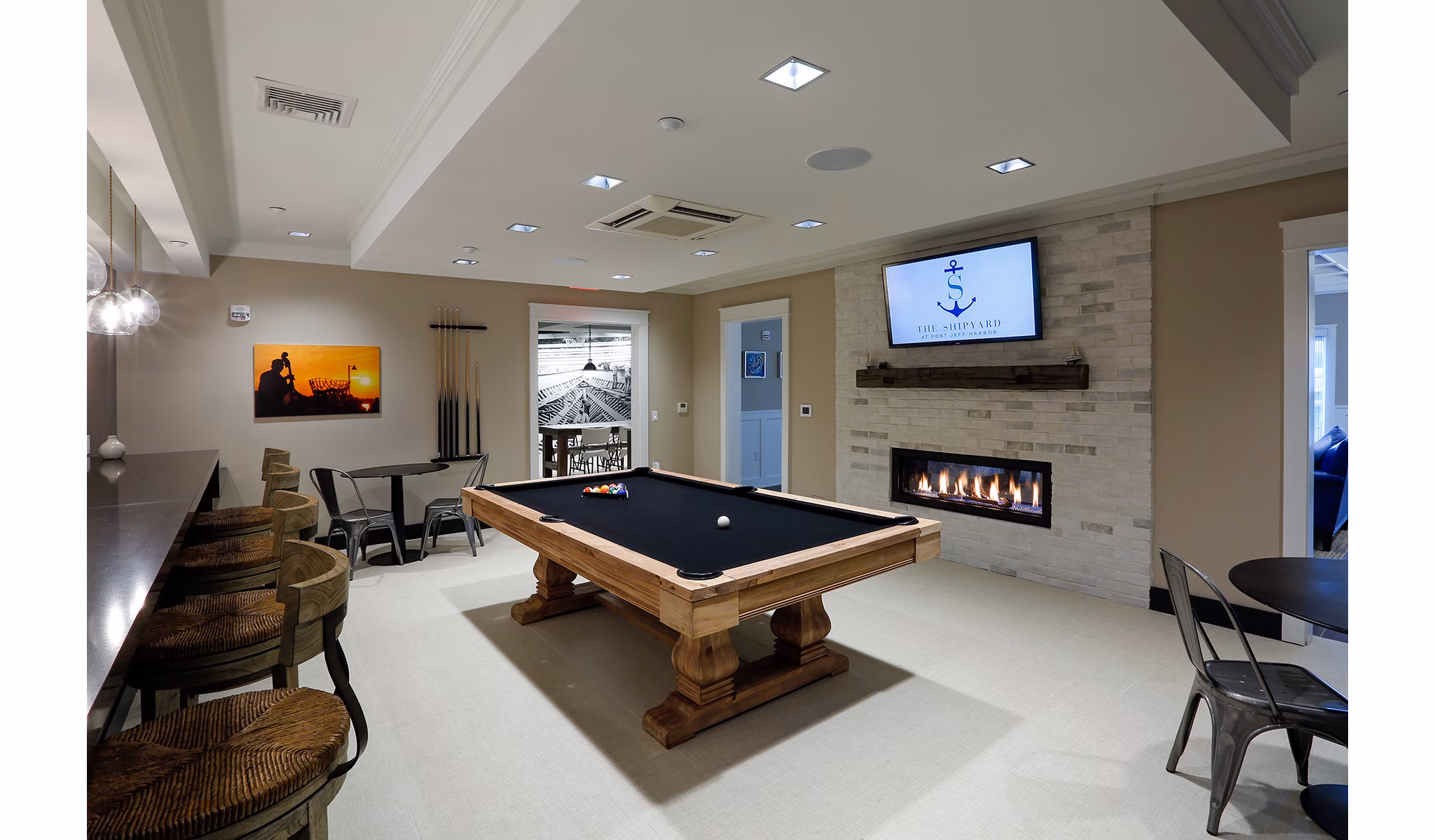 Billiards room featuring modern decor at The Shipyard at Port Jefferson Harbor Apartments