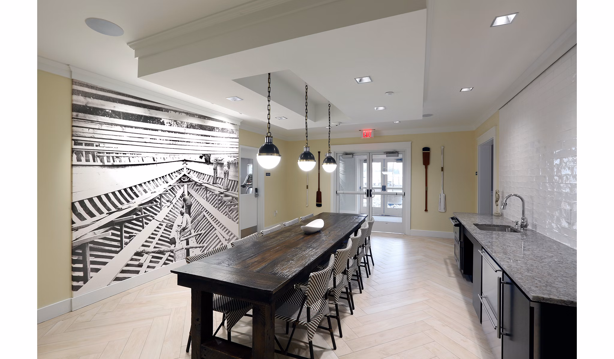 Clubhouse featuring modern decor and cozy seating at The Shipyard at Port Jefferson Harbor Apartments