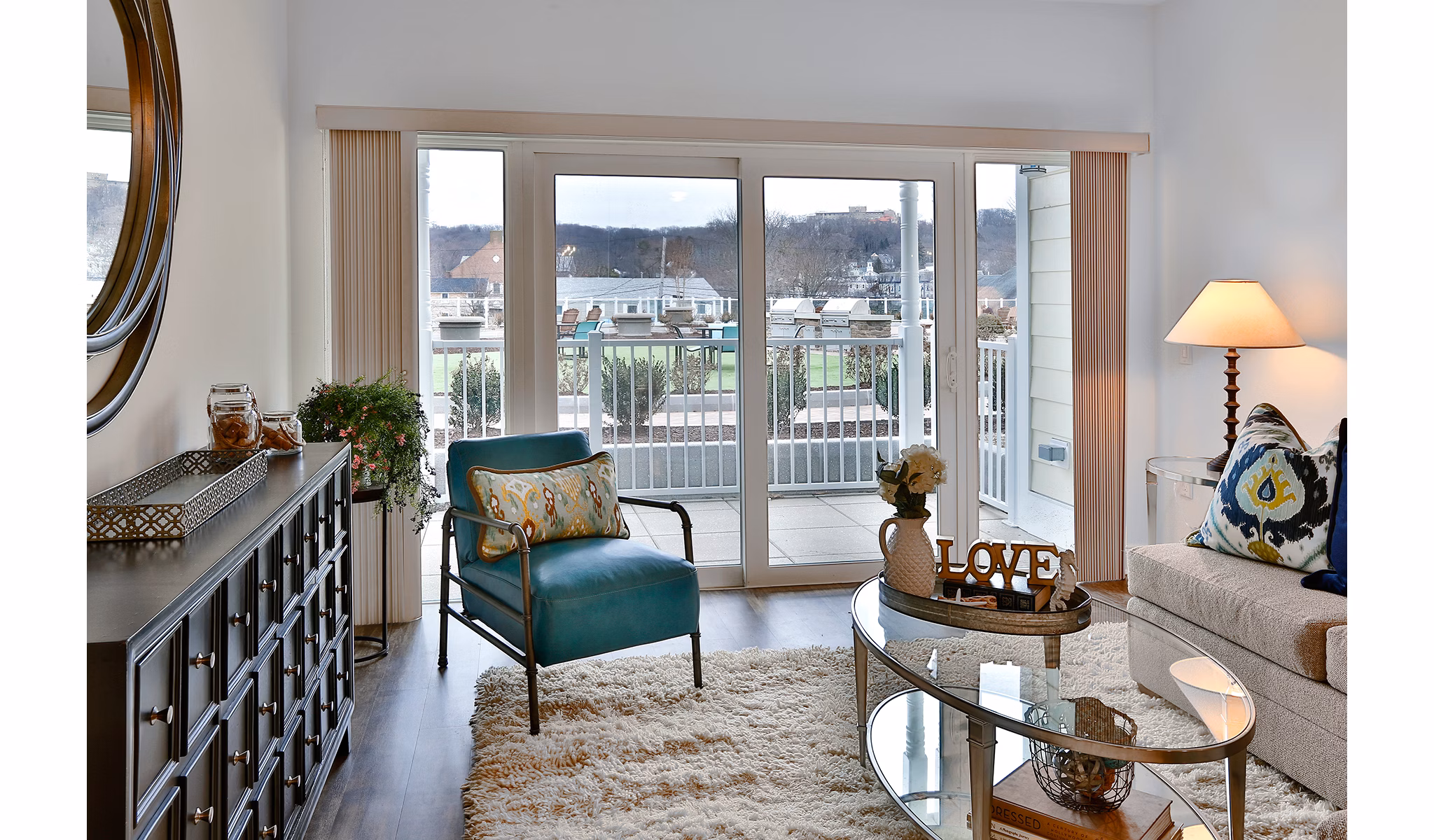 Spacious living room with modern decor in The Shipyard at Port Jefferson Harbor Apartments