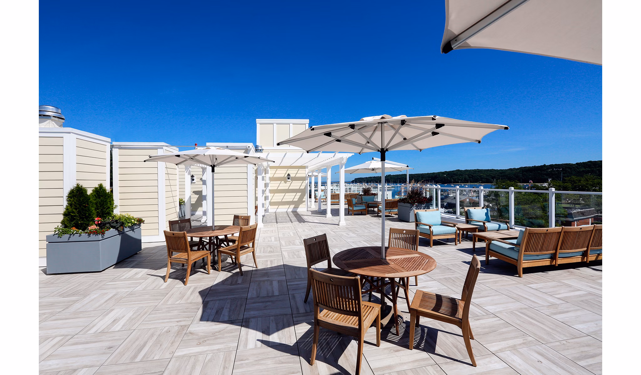 Scenic patio balcony with harbor views at The Shipyard at Port Jefferson Harbor Apartments