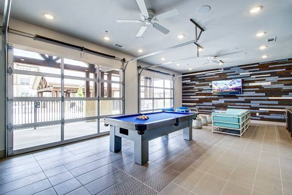 game room at Enclave Falcon Pointe Apartments