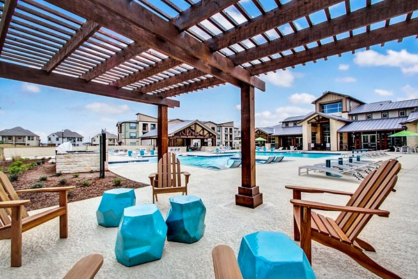 pool patio at Enclave Falcon Pointe Apartments