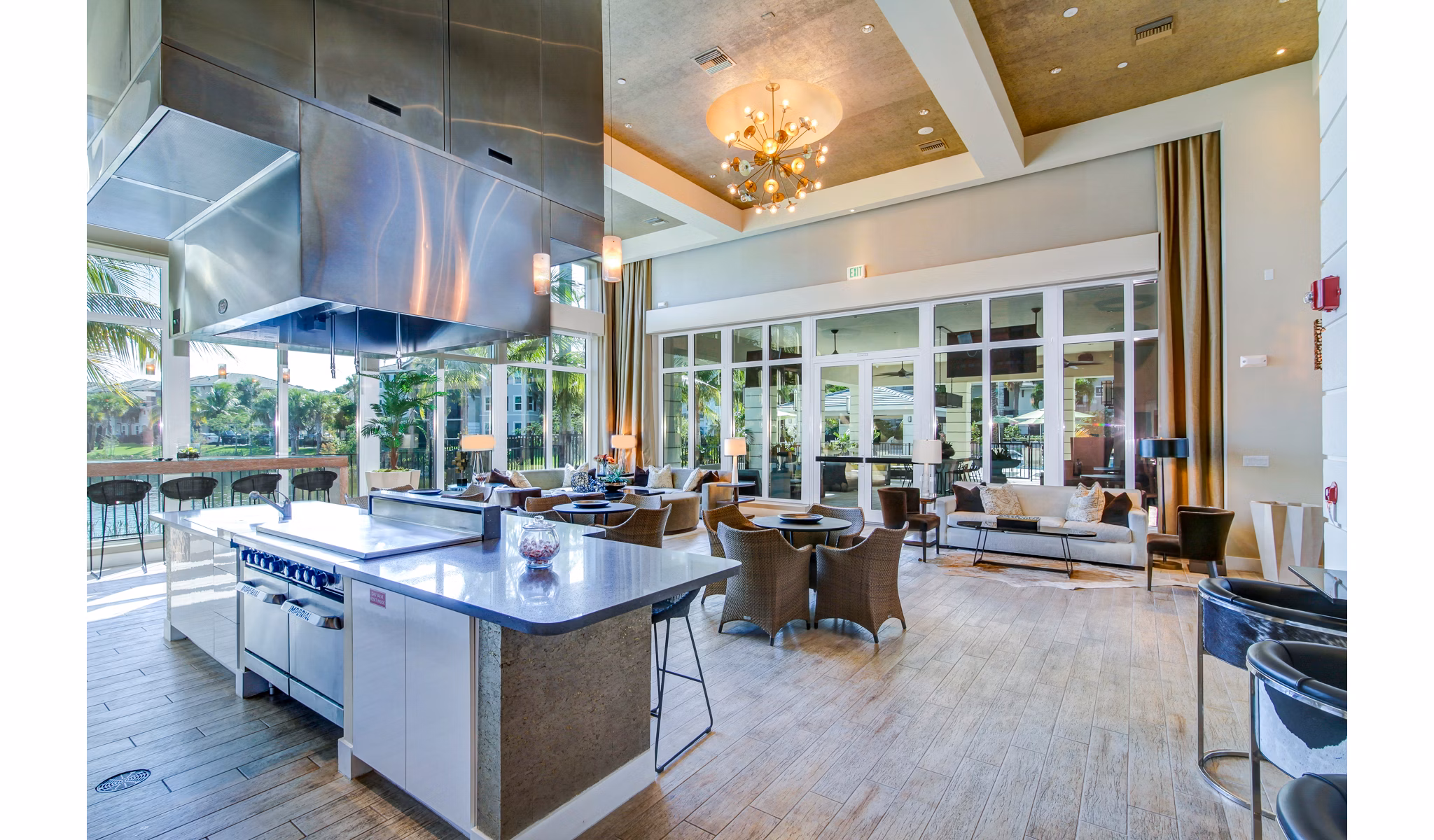 Clubhouse with modern design and amenities at The Quaye at Palm Beach Gardens Apartments