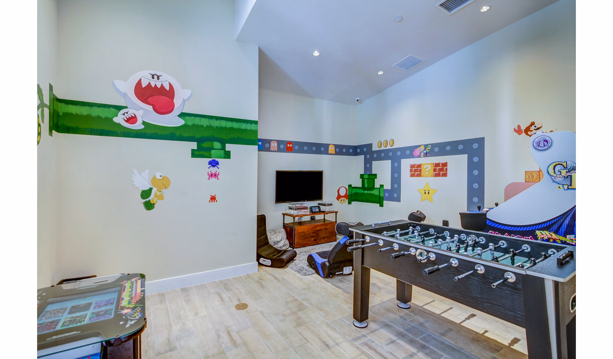 Game room with pool table at The Quaye at Palm Beach Gardens Apartments