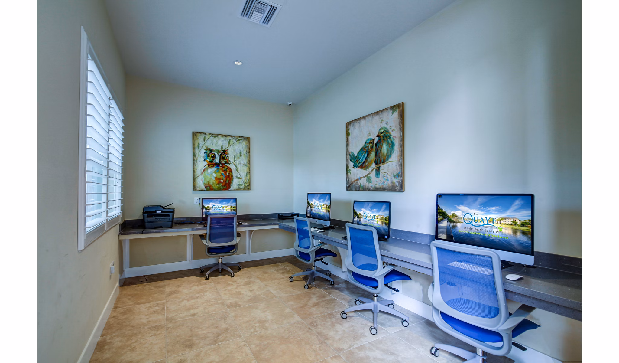 Modern business center with sleek design at The Quaye at Palm Beach Gardens Apartments