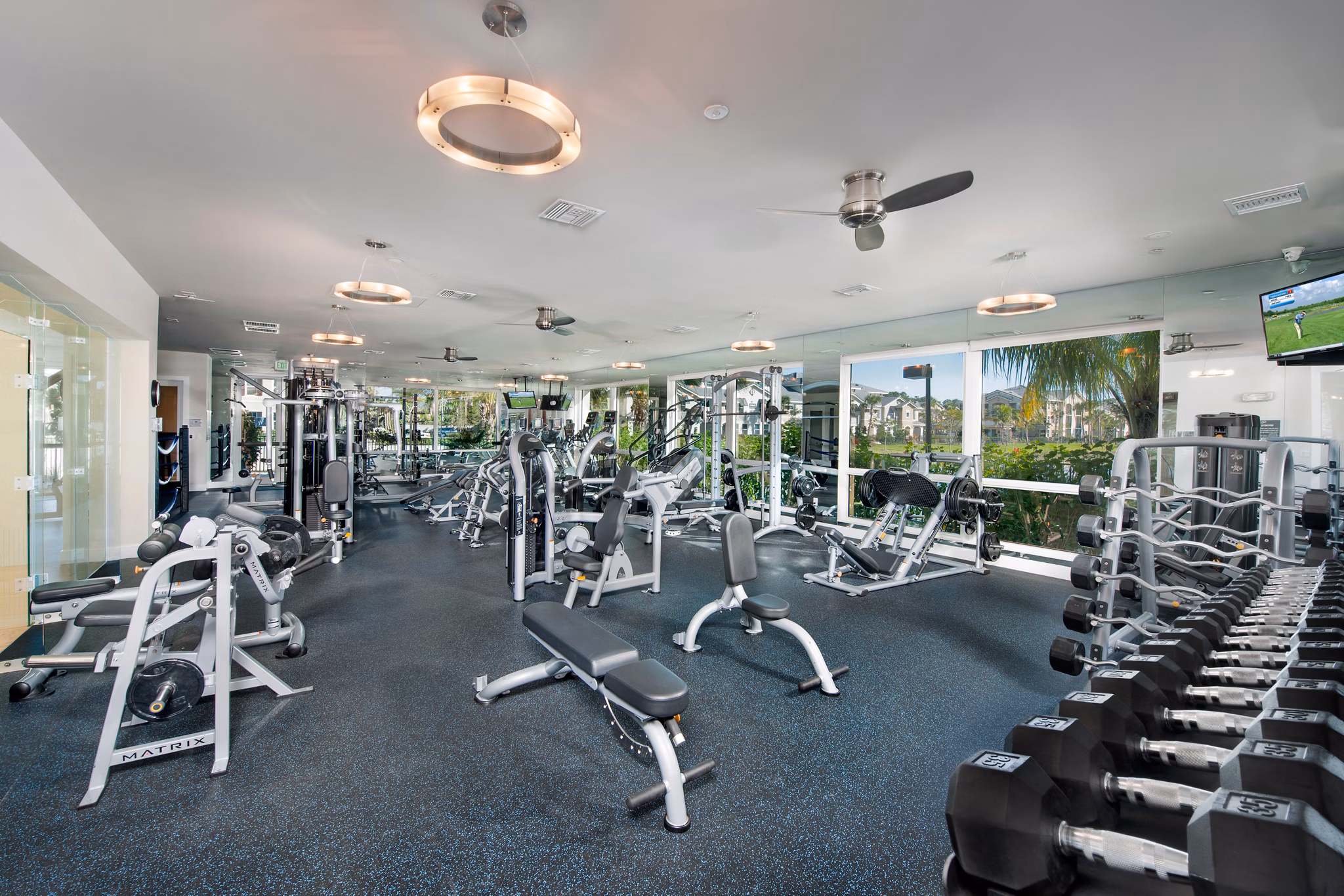 Fitness center with state-of-the-art equipment at The Quaye at Palm Beach Gardens Apartments