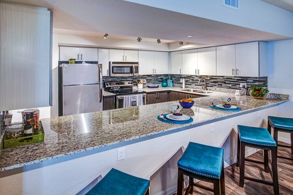 kitchen at The Quaye at Palm Beach Gardens Apartments
