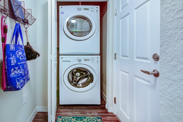 laundry room at The Quaye at Palm Beach Gardens Apartments                       