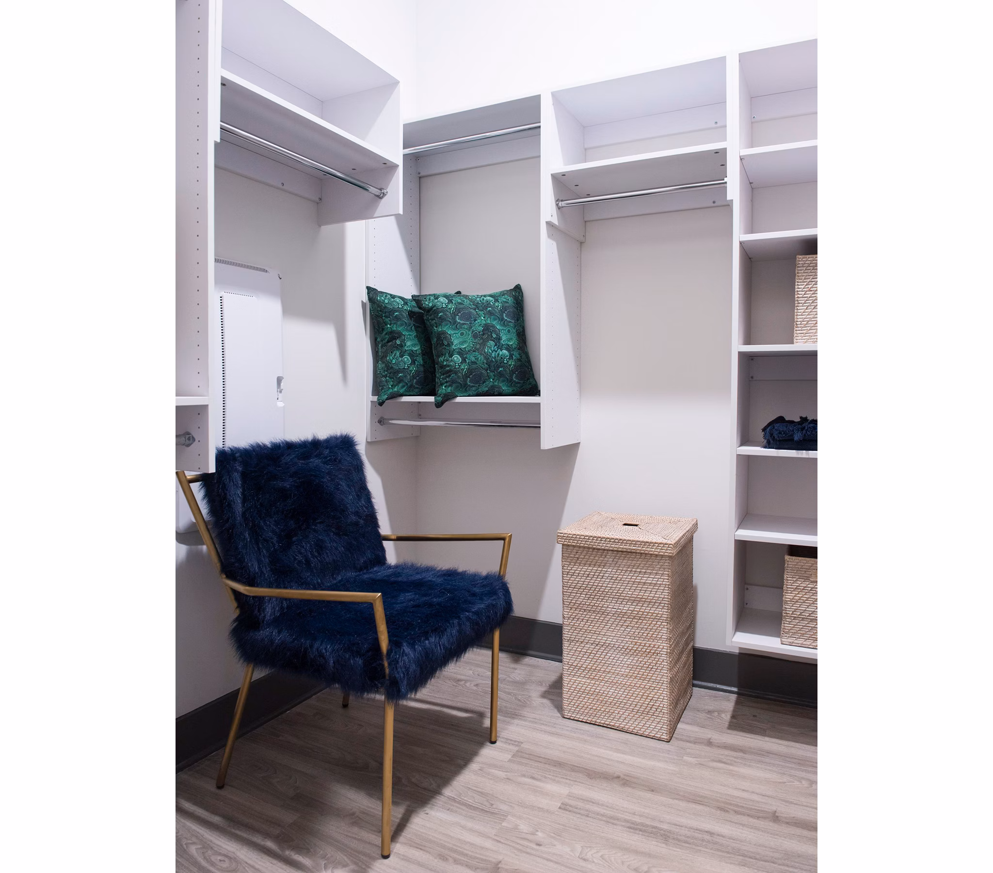 Walk-in closet with ample storage space at The Guild Apartments