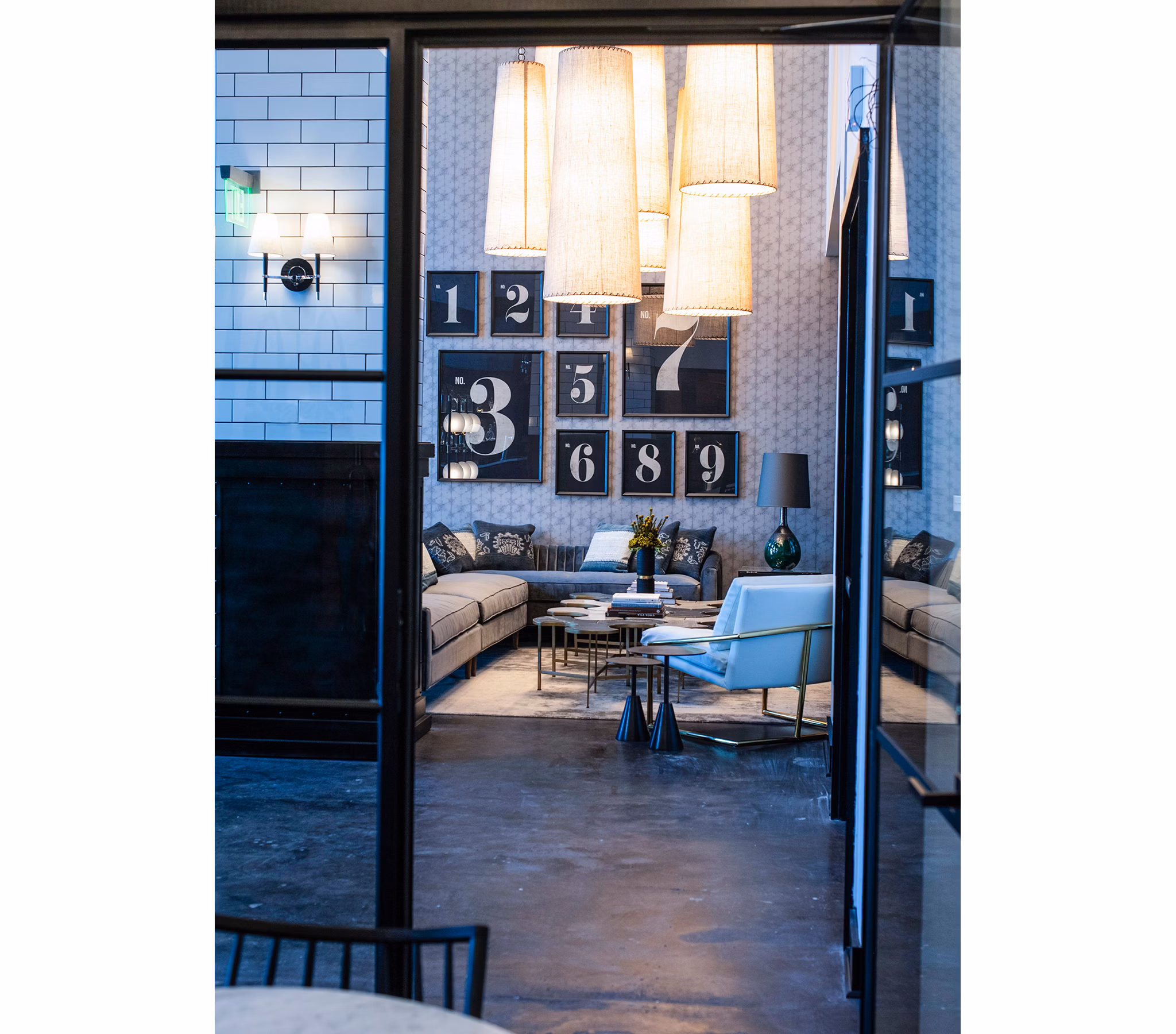 The Guild Apartments: Stylish clubhouse with contemporary design and lounge area, ideal for socializing in a luxury apartment community