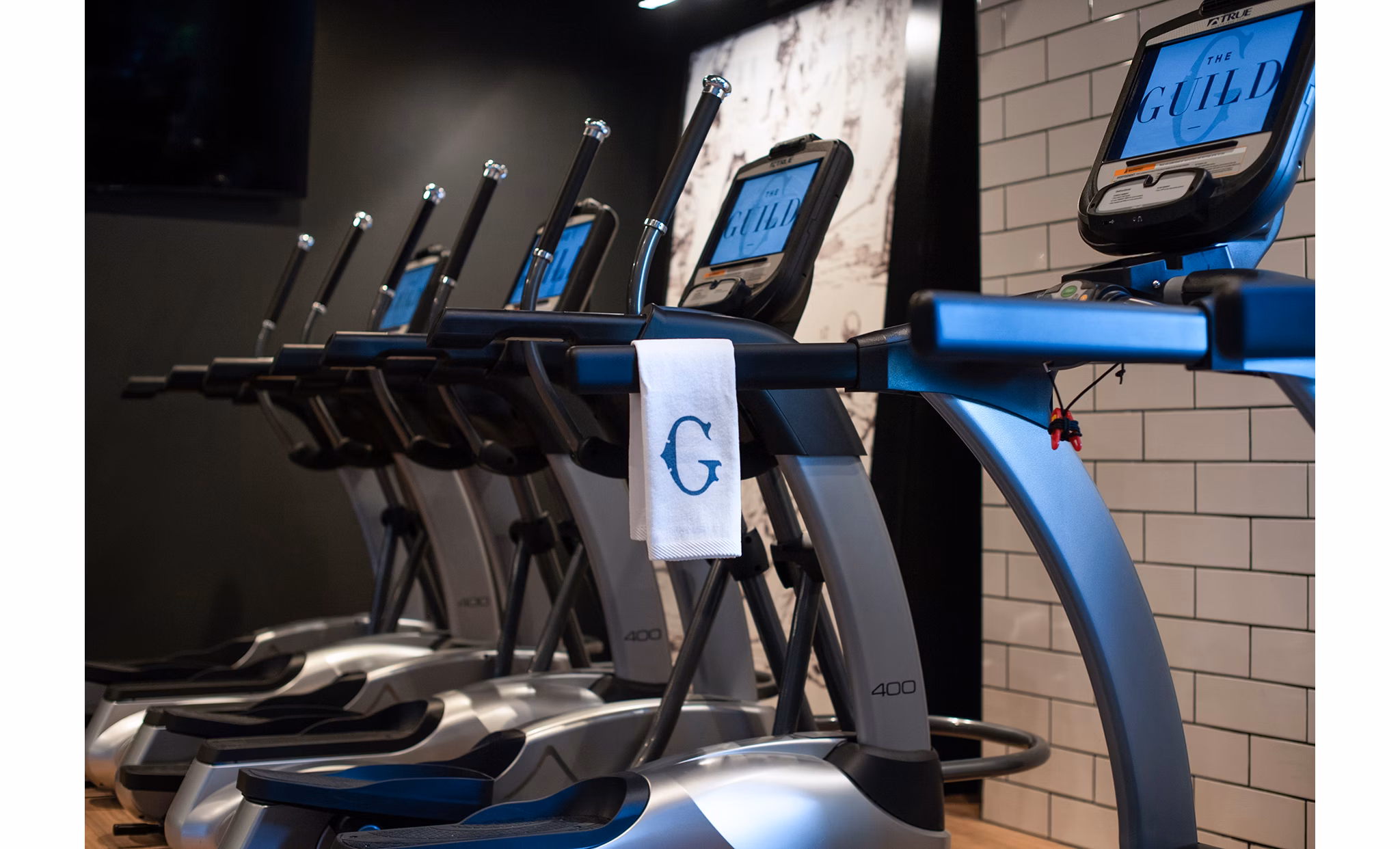 Fitness center featuring modern exercise equipment at The Guild Apartments in stylish downtown location
