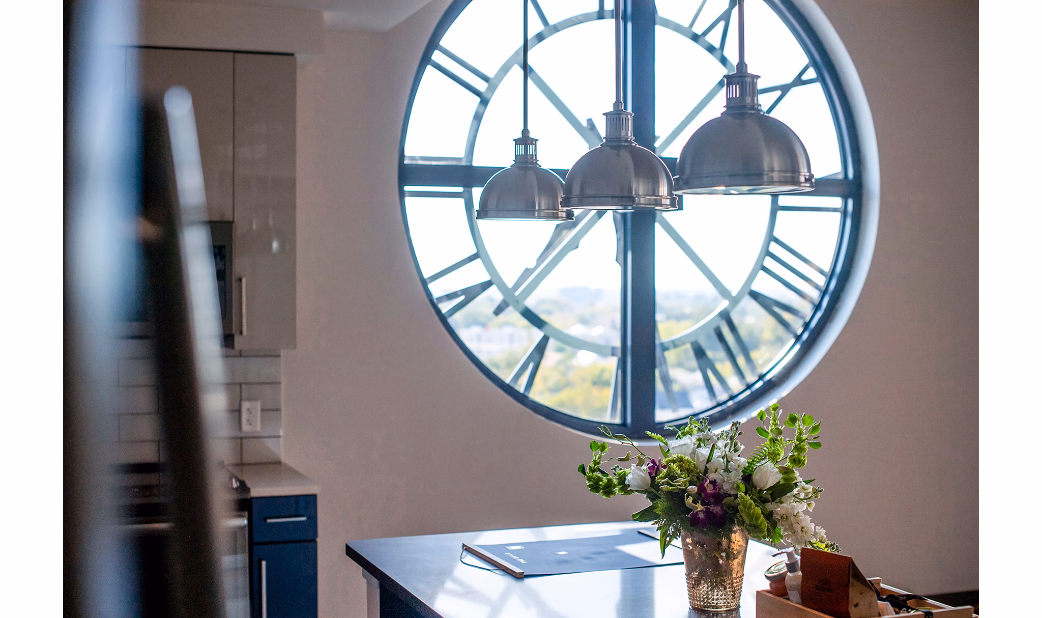 Modern kitchen featuring stainless steel appliances at The Guild Apartments, luxury living by Greystar