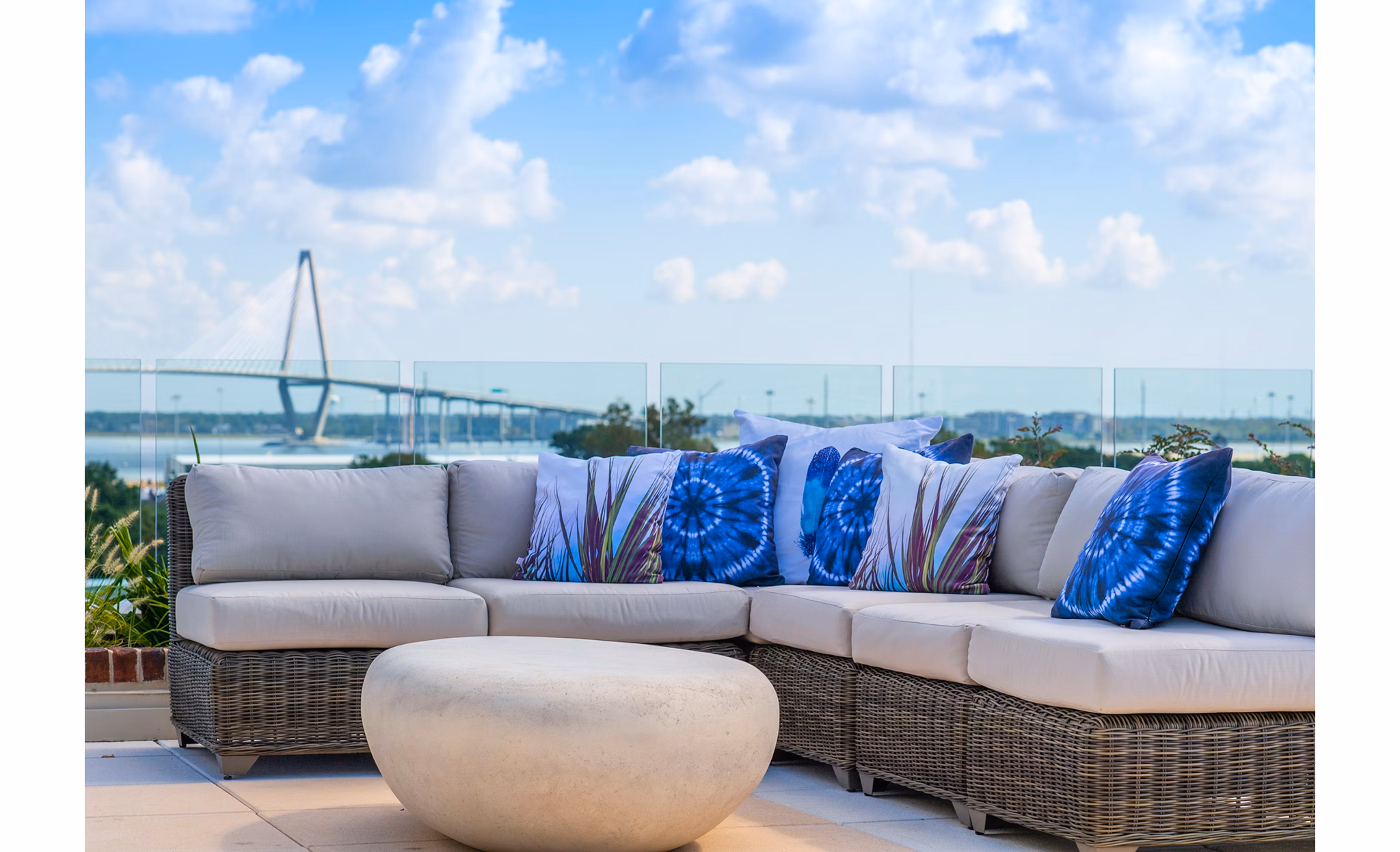 Patio with comfy seating at The Guild Apartments offering luxury outdoor living spaces