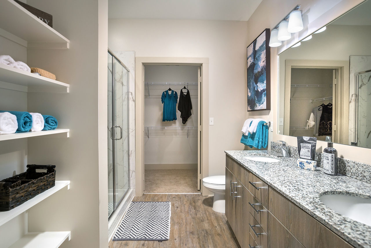 Sea Glass Apartments: Modern bathroom with sleek fixtures and elegant design