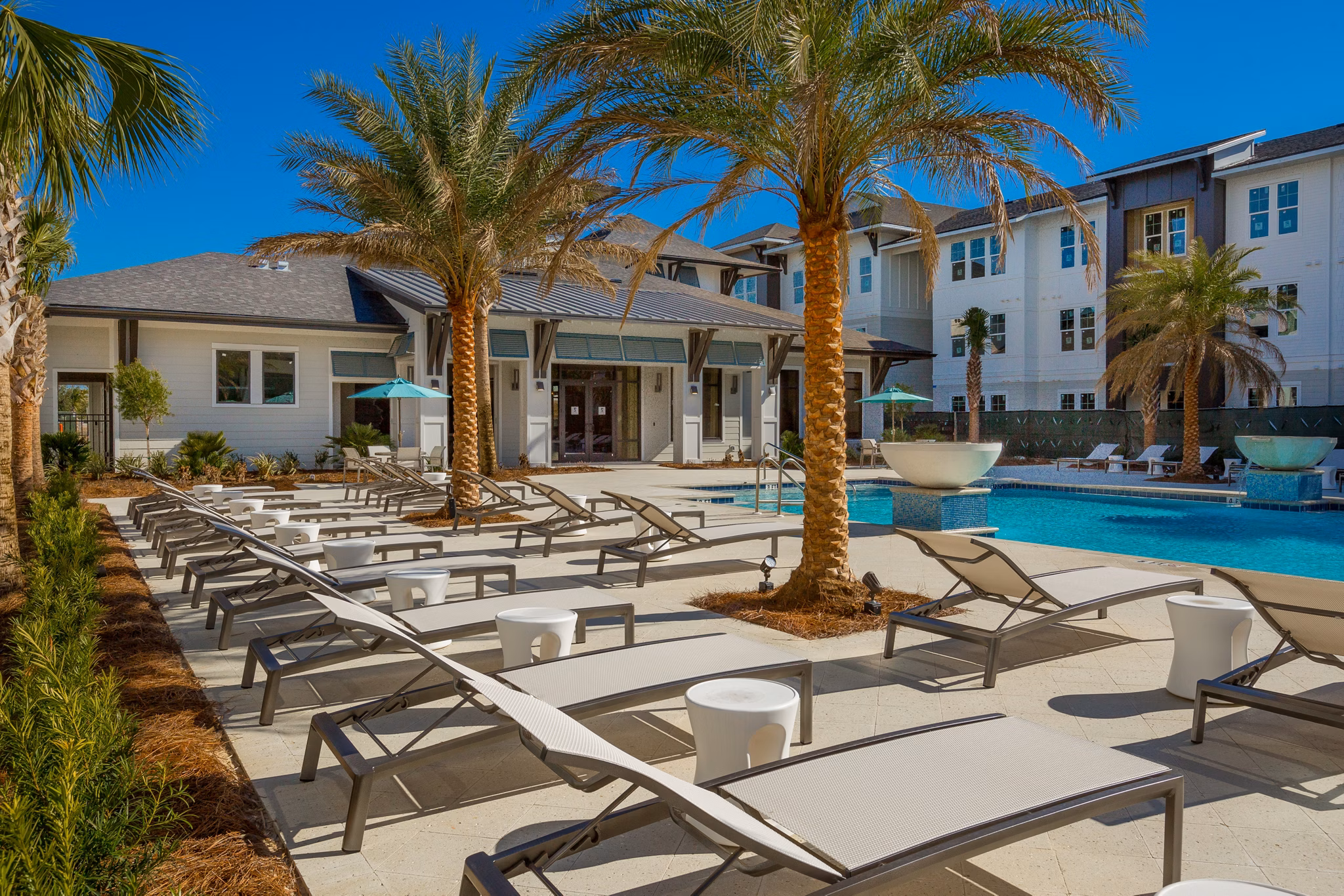 Luxurious pool with private cabanas at Sea Glass Apartments, a Greystar luxury property