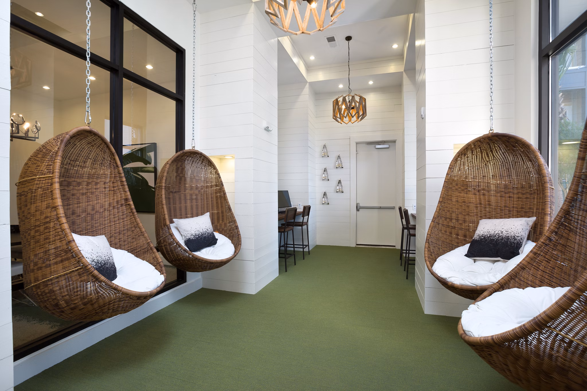 Bright lounge area with modern furniture in Sea Glass Apartments