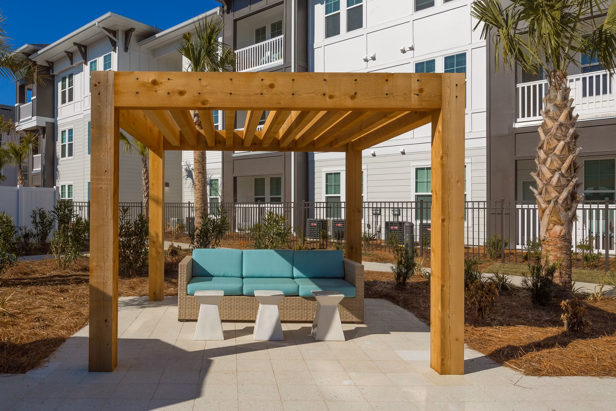 Outdoor patio with stylish seating at Sea Glass Apartments, a Greystar luxury community
