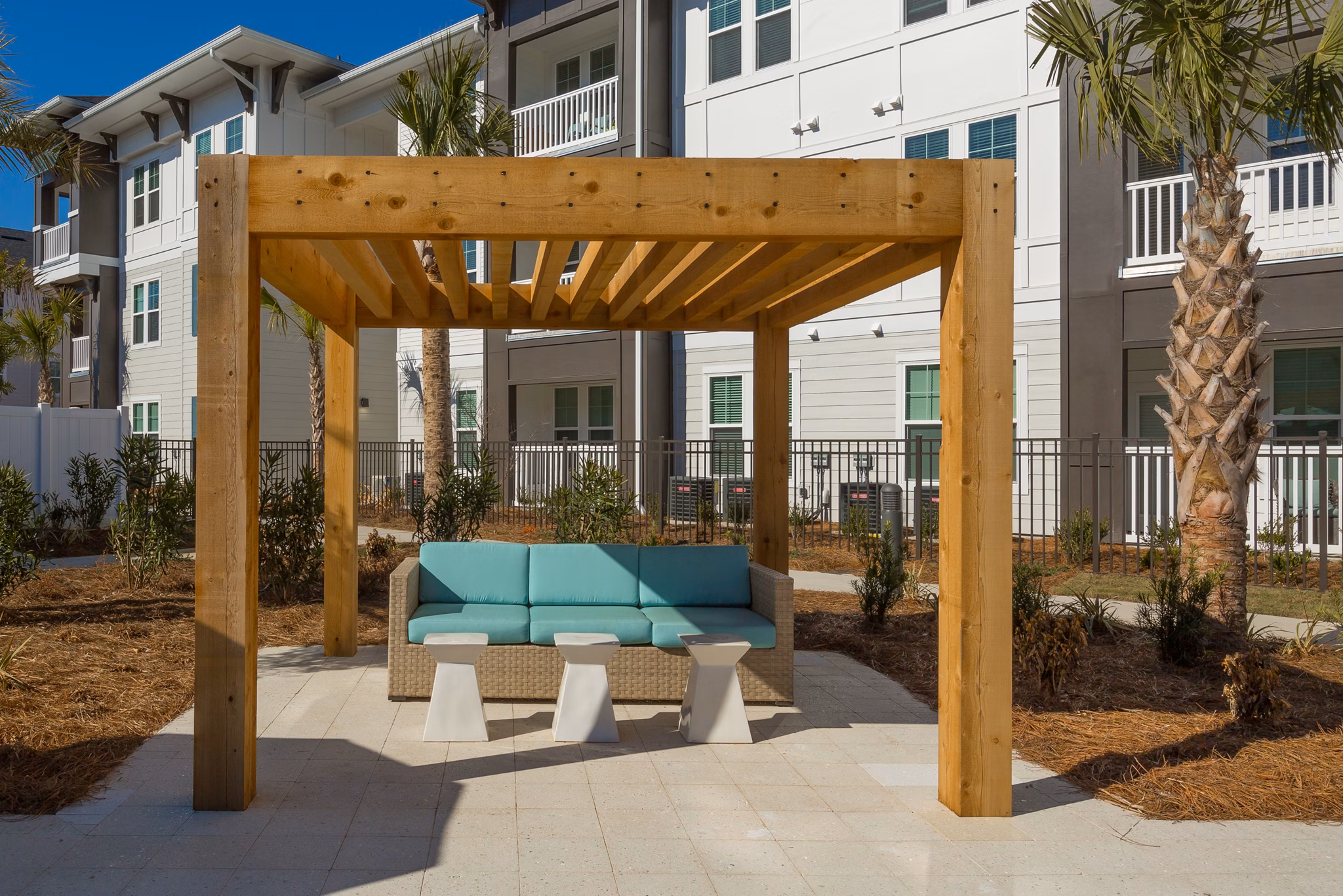 Outdoor patio with stylish seating at Sea Glass Apartments, a Greystar luxury community