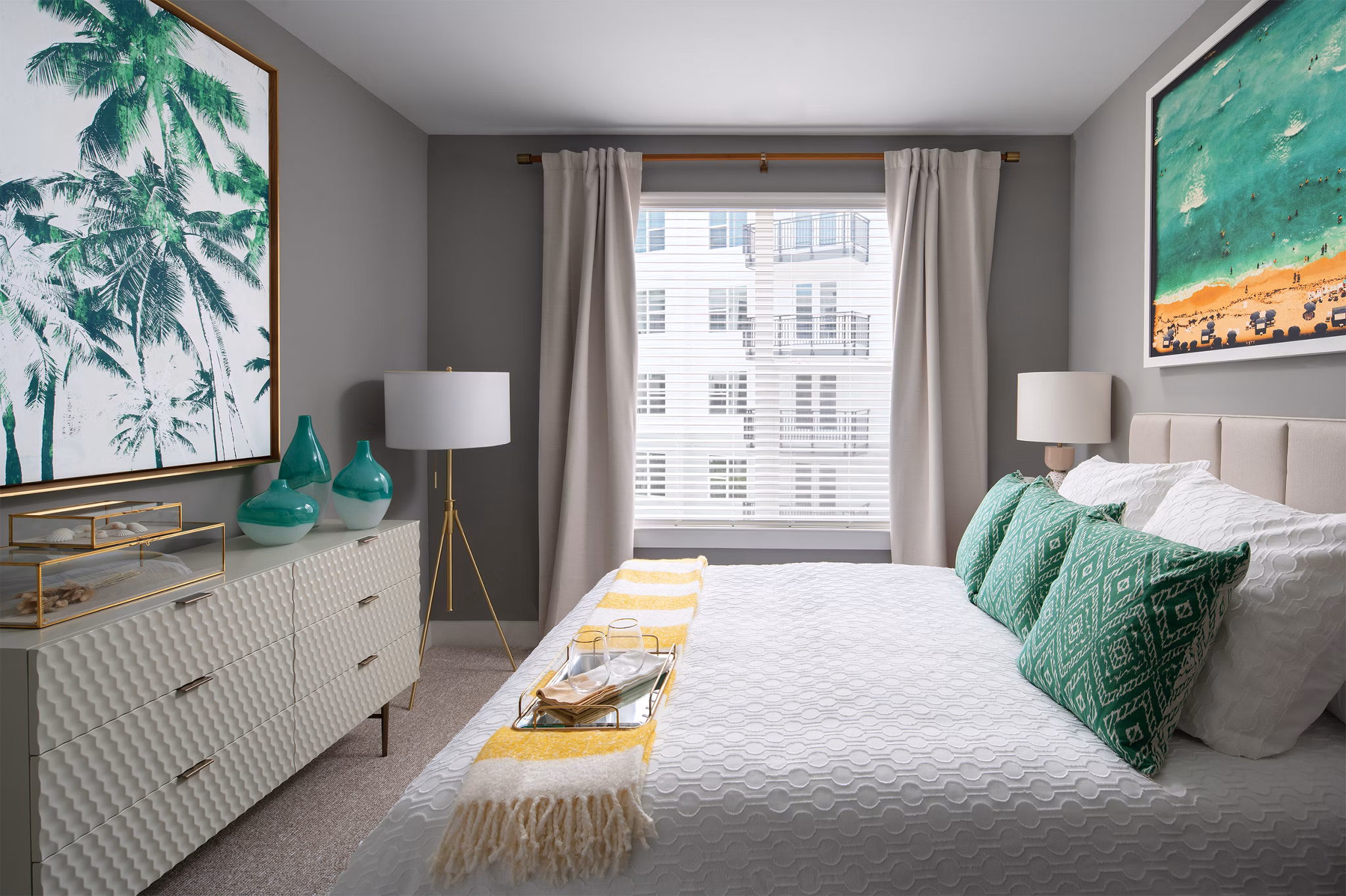 Cozy bedroom with modern furnishings at Novel Riverwalk Apartments