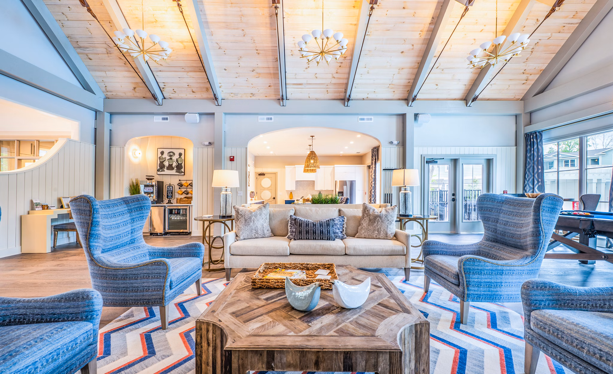 Elegant clubhouse with modern seating and decor at Atlantic at Grand Oaks Apartments