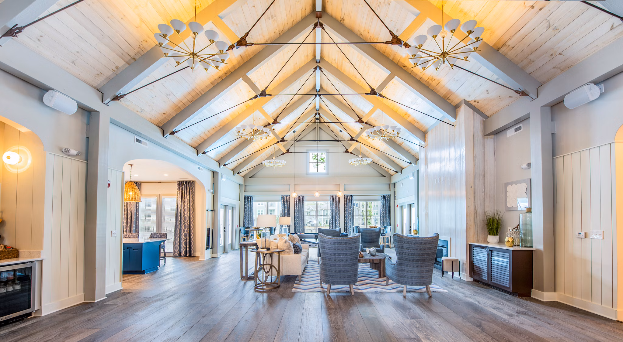 Clubhouse with modern design and elegant furnishings at Atlantic at Grand Oaks Apartments