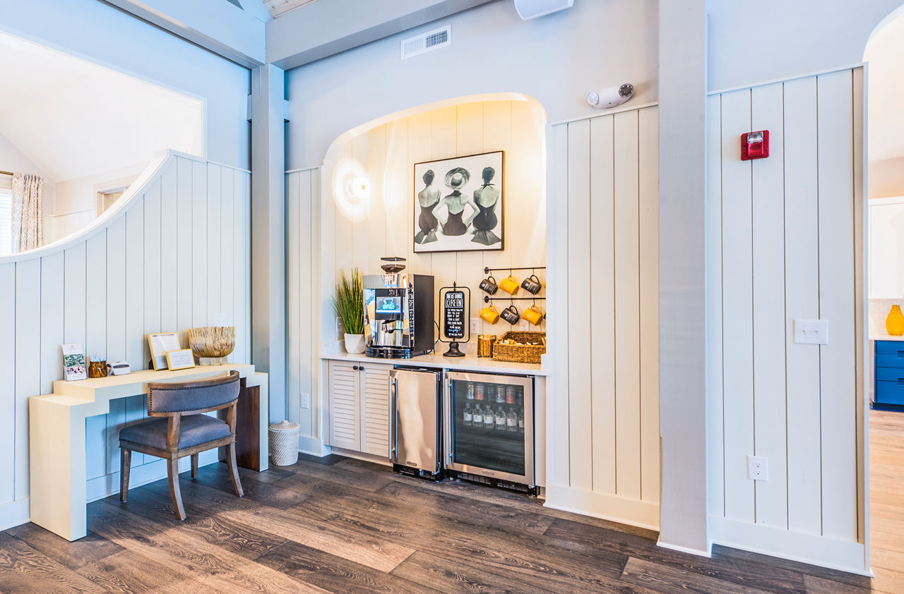 Elegant clubhouse with cozy seating areas at Atlantic at Grand Oaks Apartments
