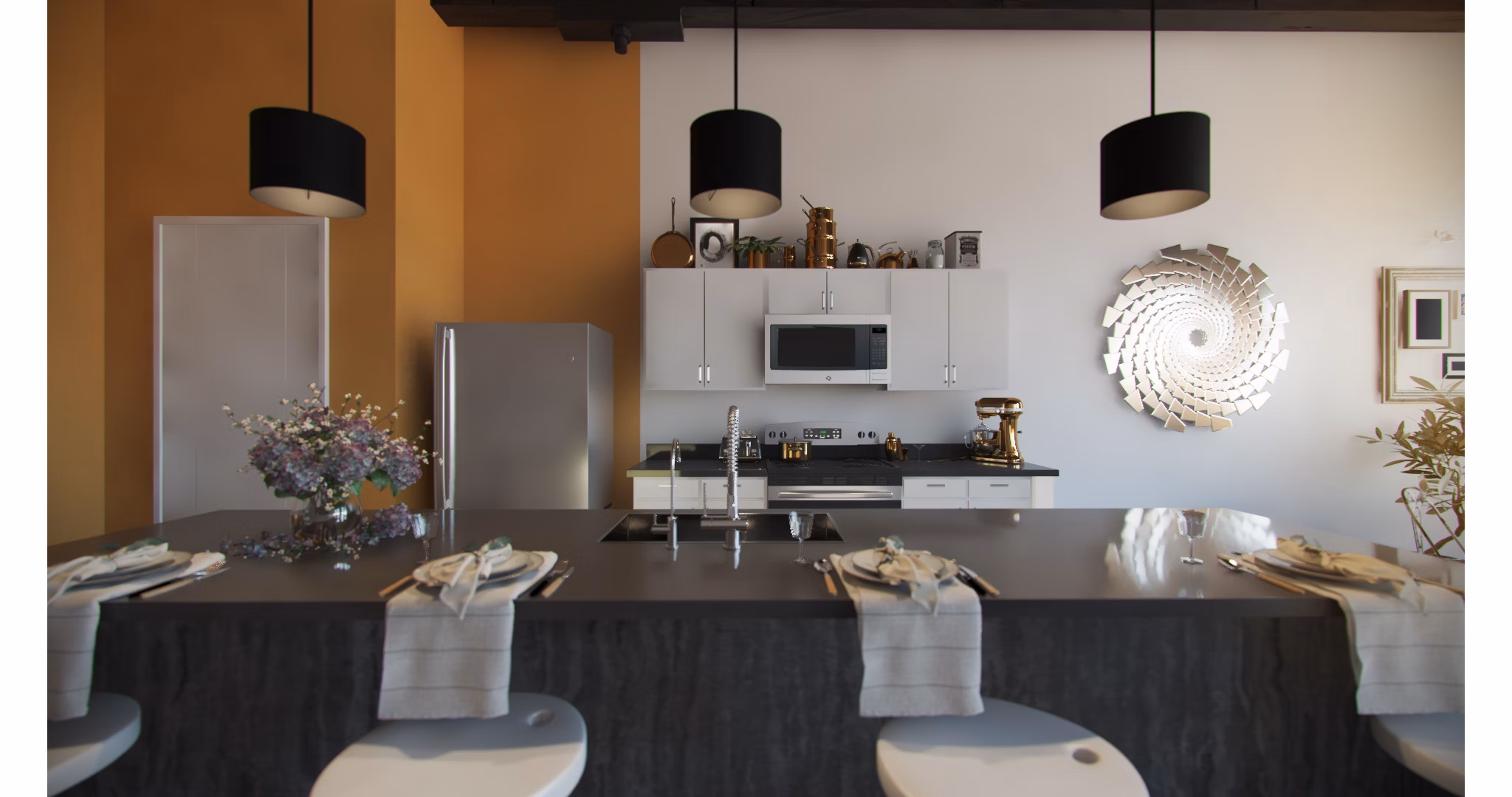 Modern kitchen with stainless steel appliances in Hercules Apartments