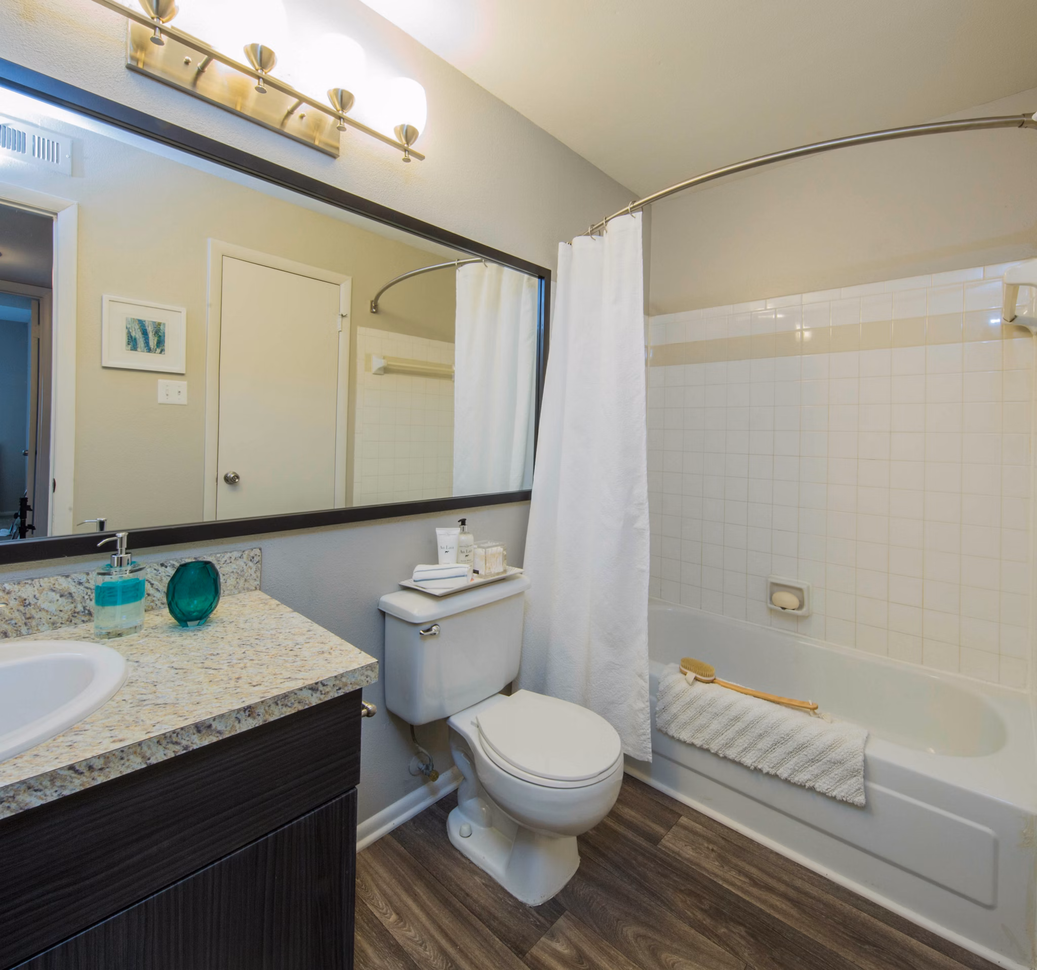 Modern bathroom with sleek fixtures at Lakeside Mill Apartments