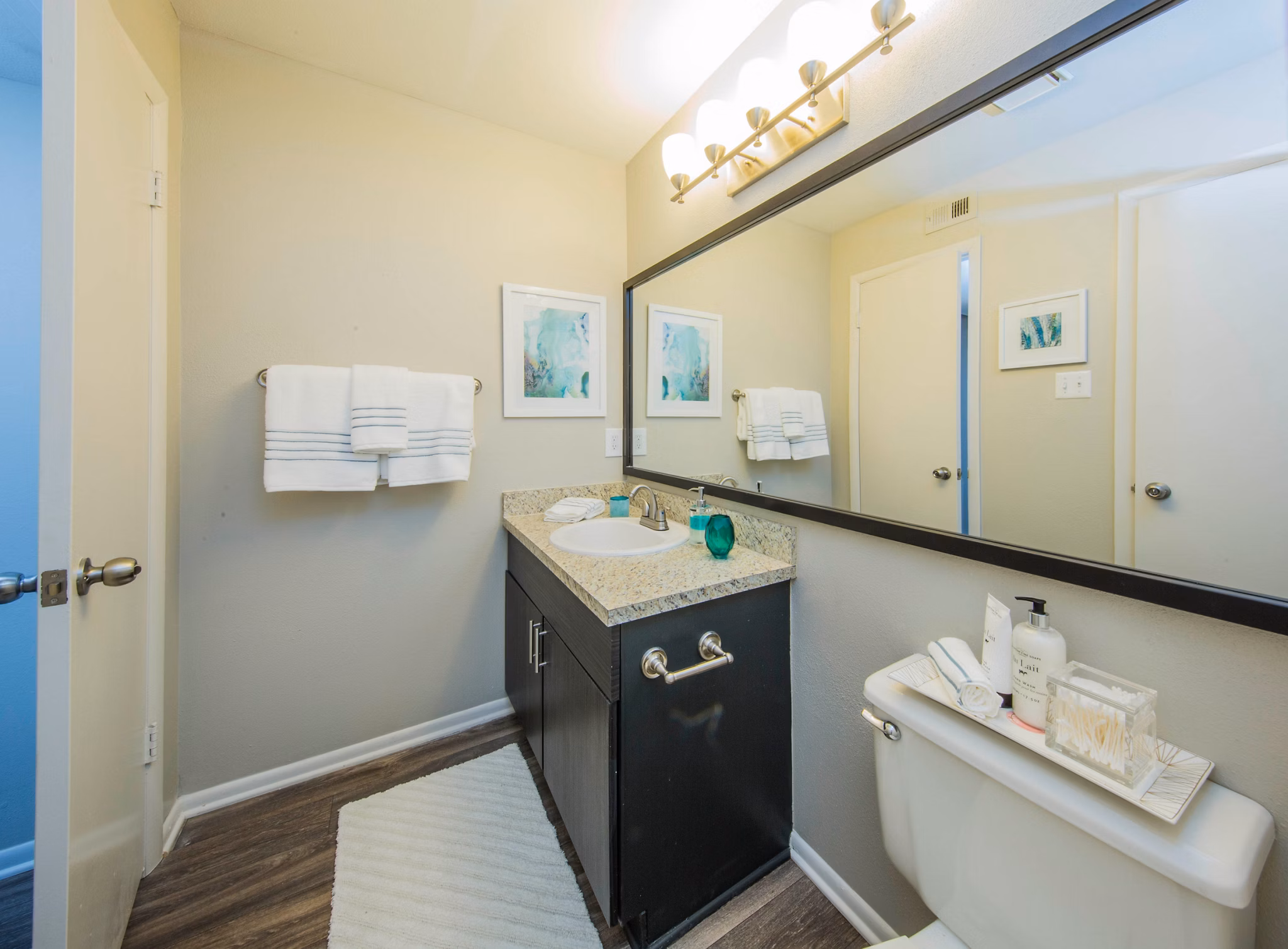 Modern bathroom with sleek fixtures at Lakeside Mill Apartments