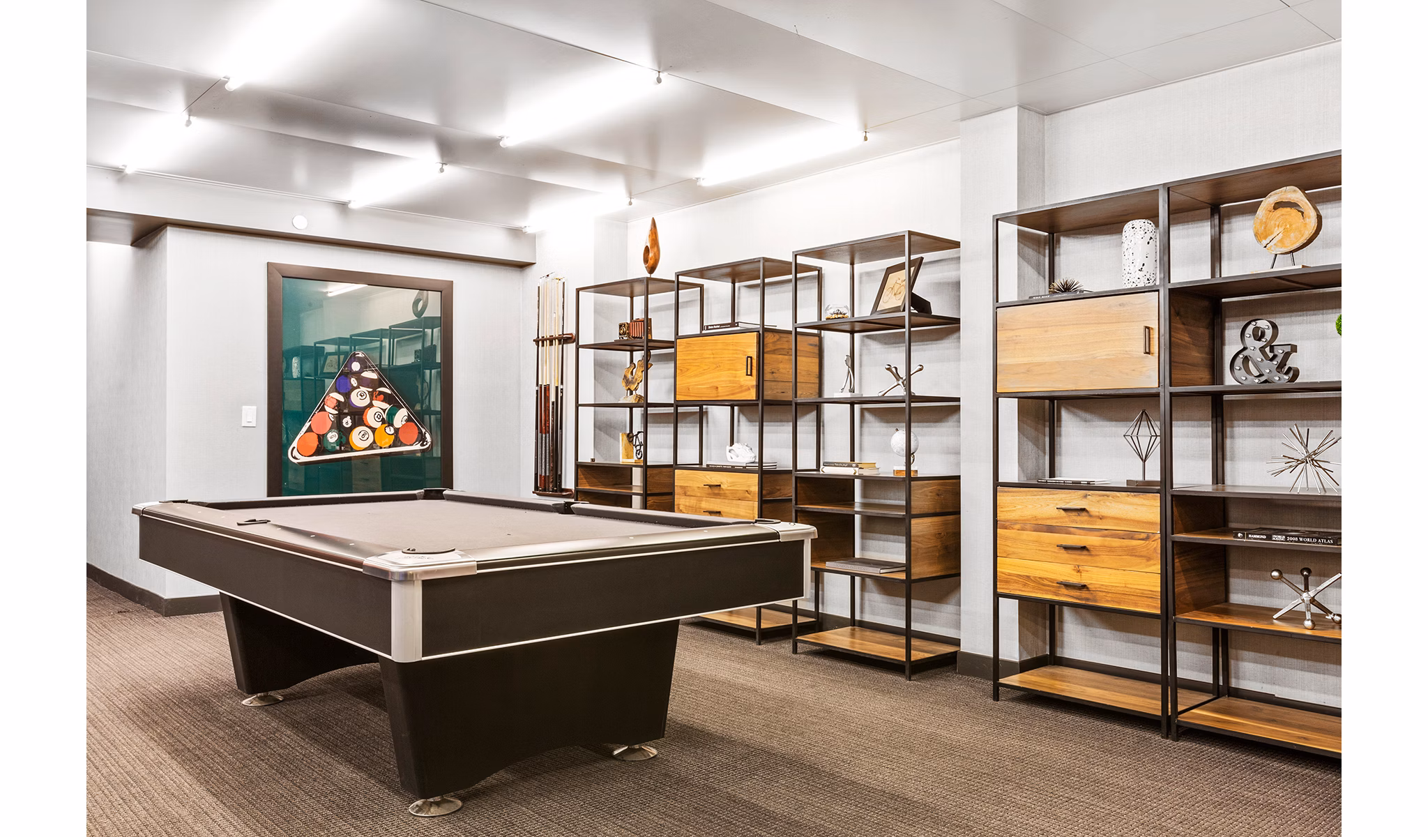 Game room featuring pool tables and gaming consoles at 461 Dean Apartments: Luxury amenities in Brooklyn, NY.