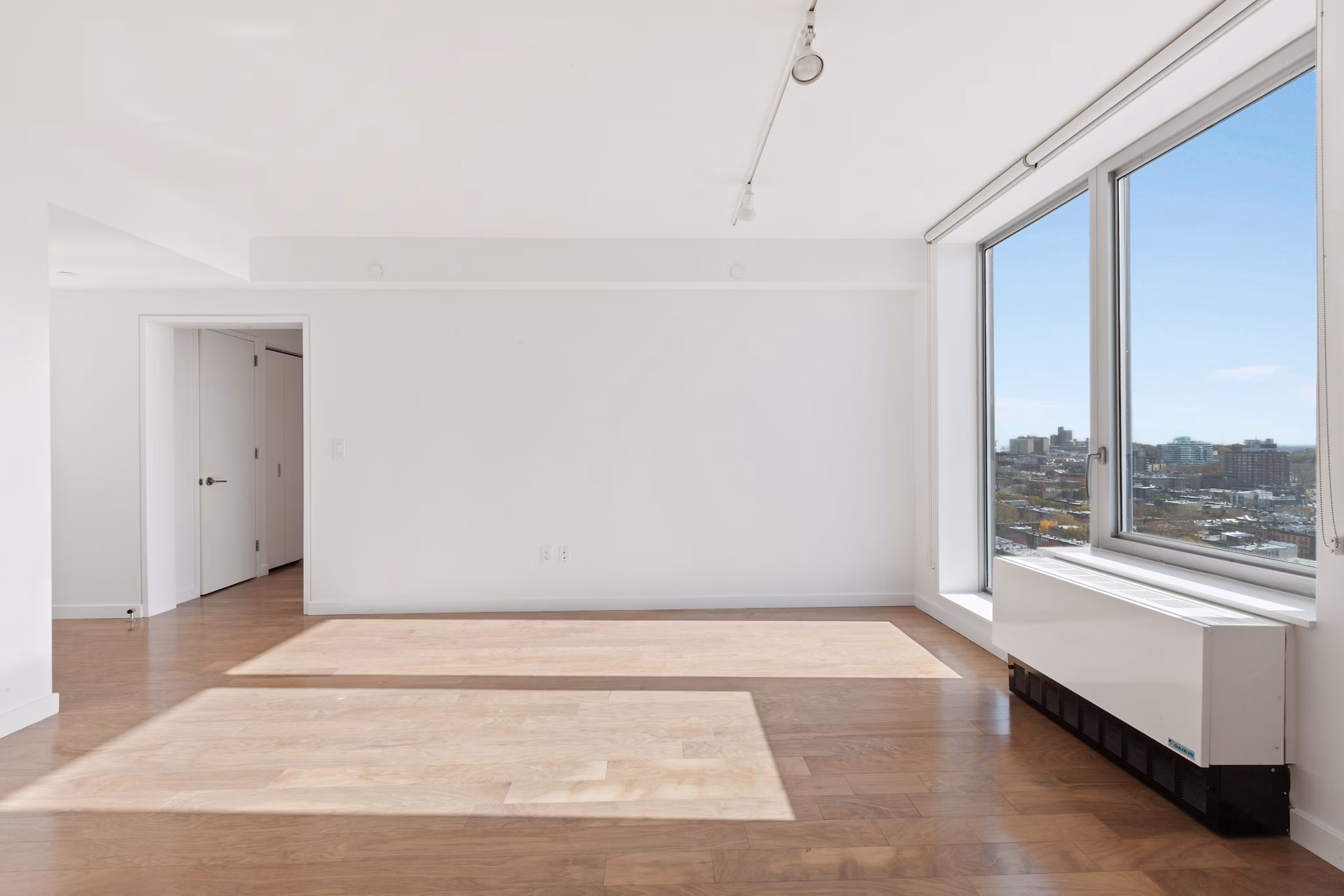 Spacious living room with modern furnishings in 461 Dean Apartments