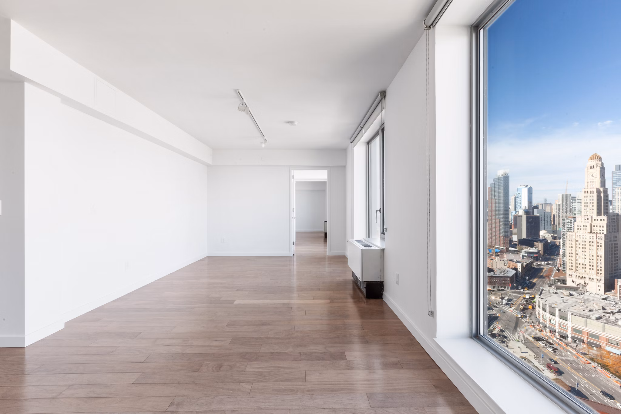 Spacious living room with modern furnishings at 461 Dean Apartments