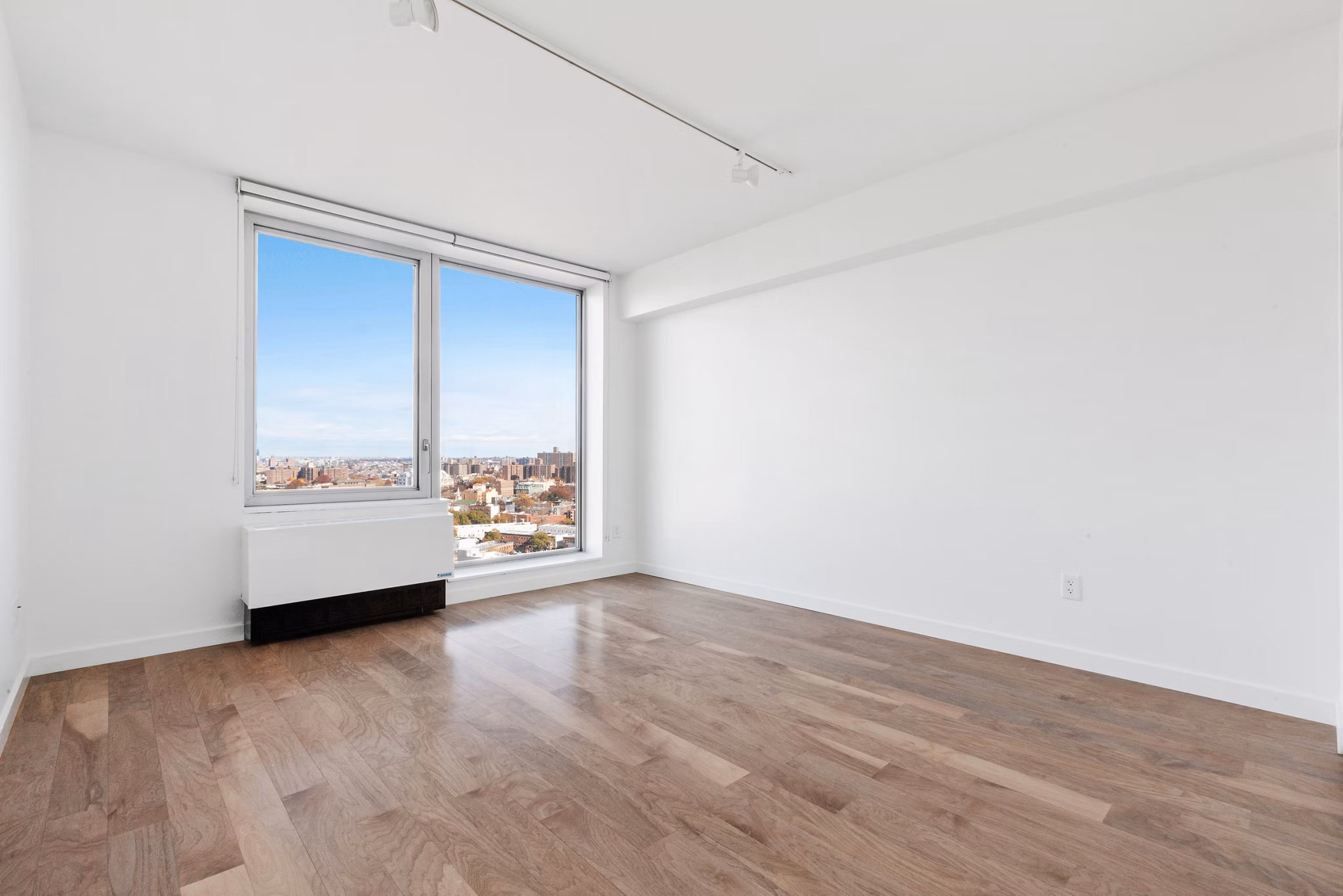Spacious living room with modern furnishings at 461 Dean Apartments