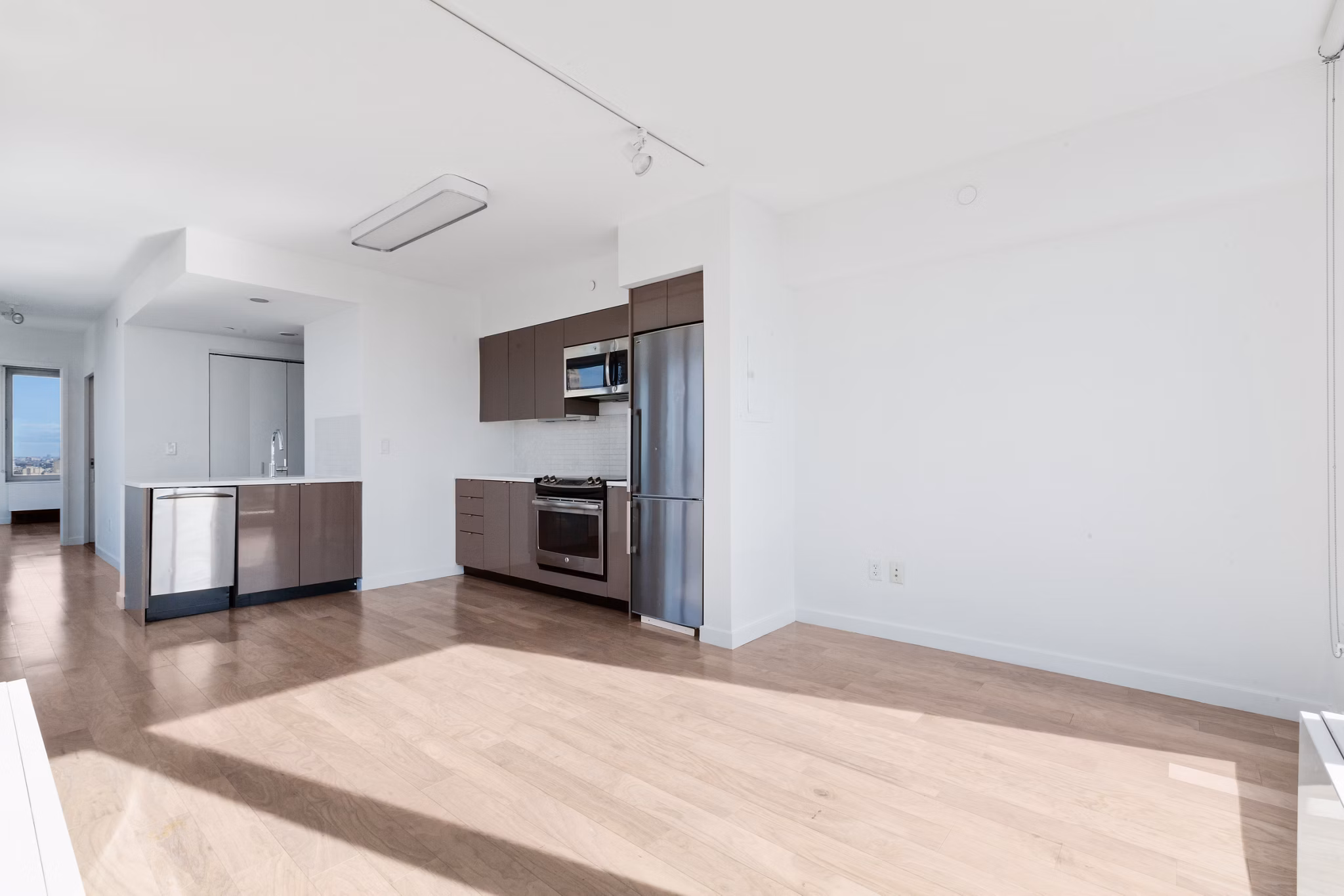 Modern living room with ample natural light at 461 Dean Apartments, offering luxury interiors in the heart of Brooklyn