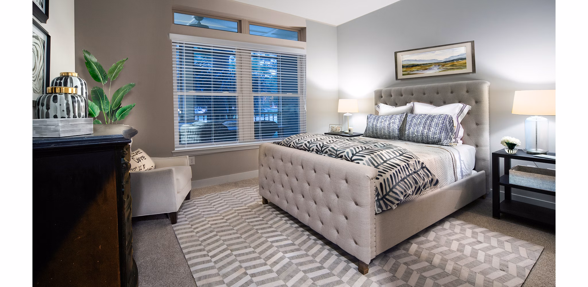 Elegant bedroom with serene decor at WaterWalk luxury apartments, Shelter Cove Towne Centre