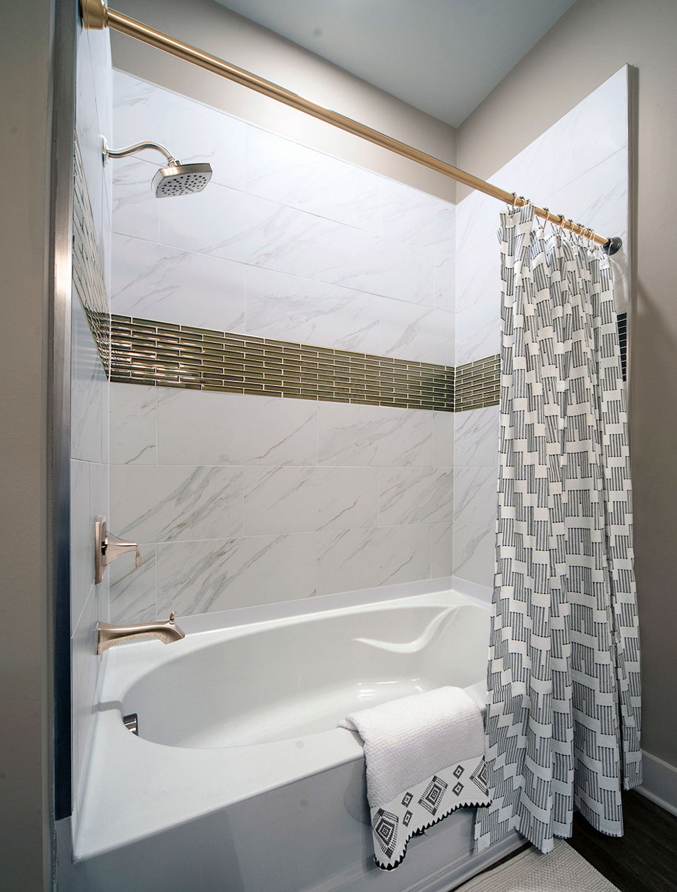 Bathroom with modern fixtures at WaterWalk at Shelter Cove Towne Centre, featuring sleek vanity and spacious shower