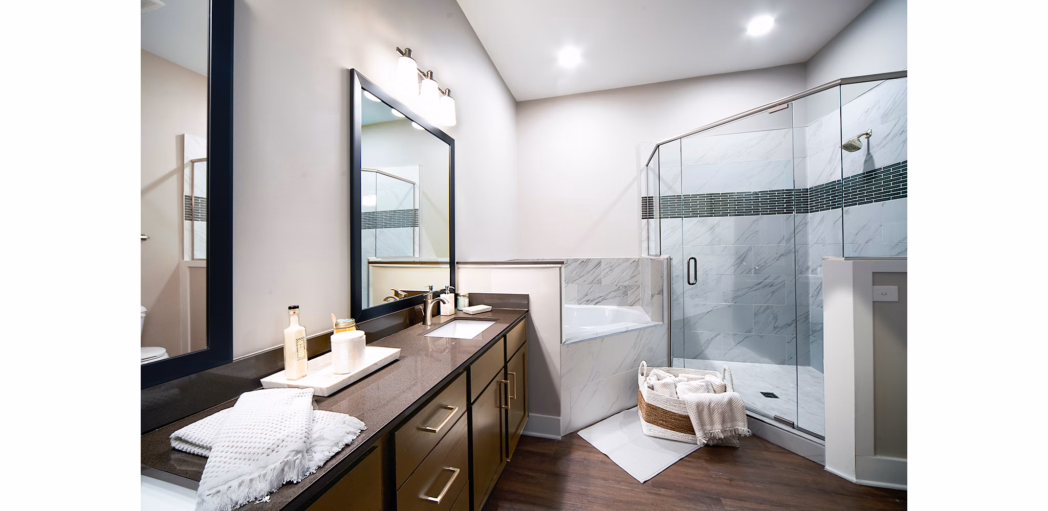 Luxury bathroom with marble accents at WaterWalk at Shelter Cove Towne Centre