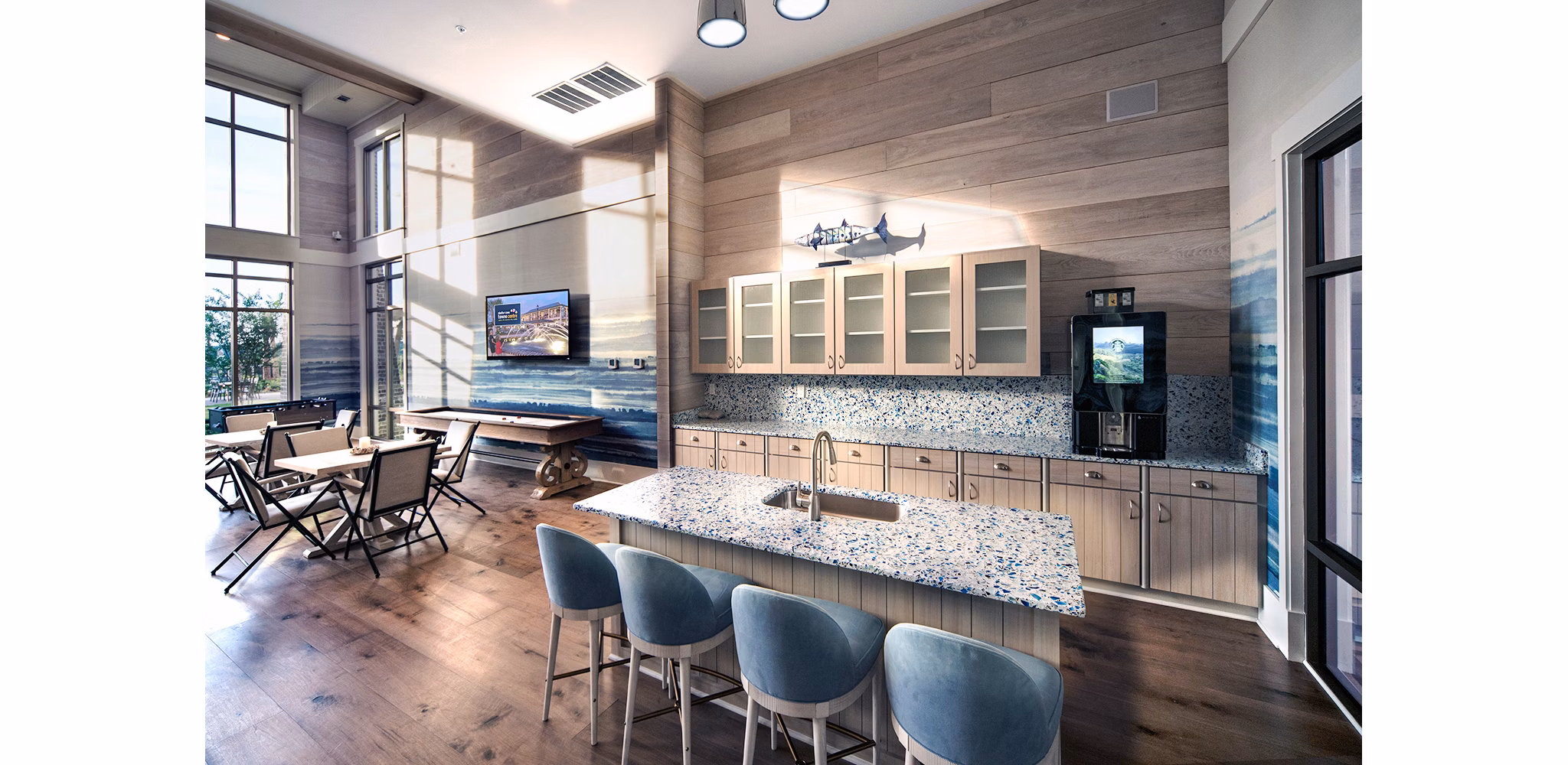 Clubhouse featuring modern design and cozy seating at WaterWalk at Shelter Cove Towne Centre luxury apartments