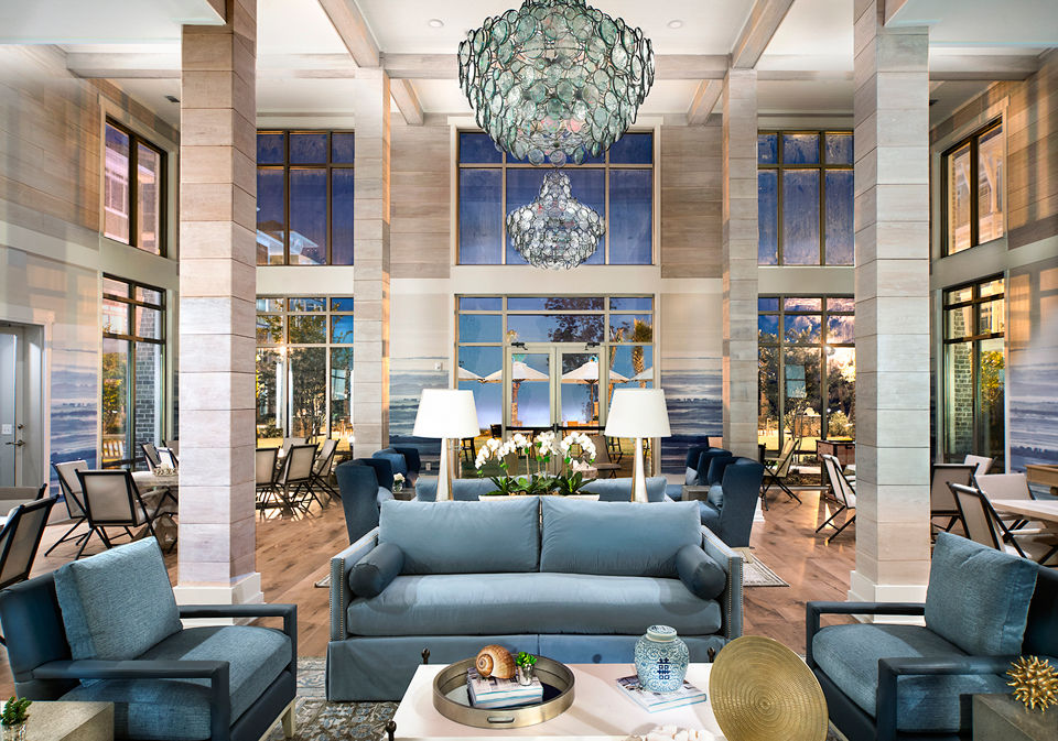 Clubhouse with modern decor and seating areas at WaterWalk at Shelter Cove Towne Centre luxury apartments