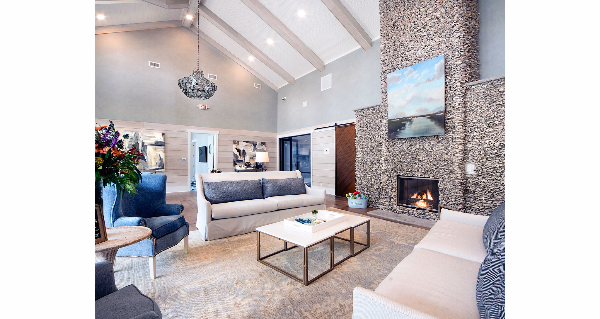 Modern clubhouse at WaterWalk luxury apartments in Shelter Cove Towne Centre with cozy seating areas