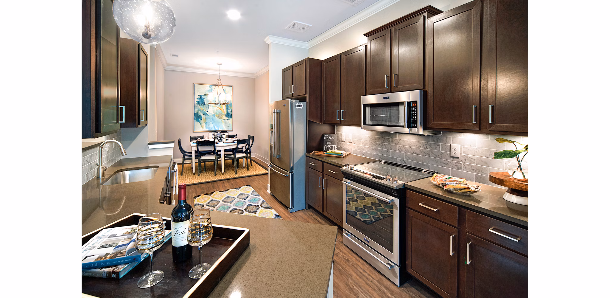 Modern kitchen with sleek appliances at WaterWalk in Shelter Cove Towne Centre