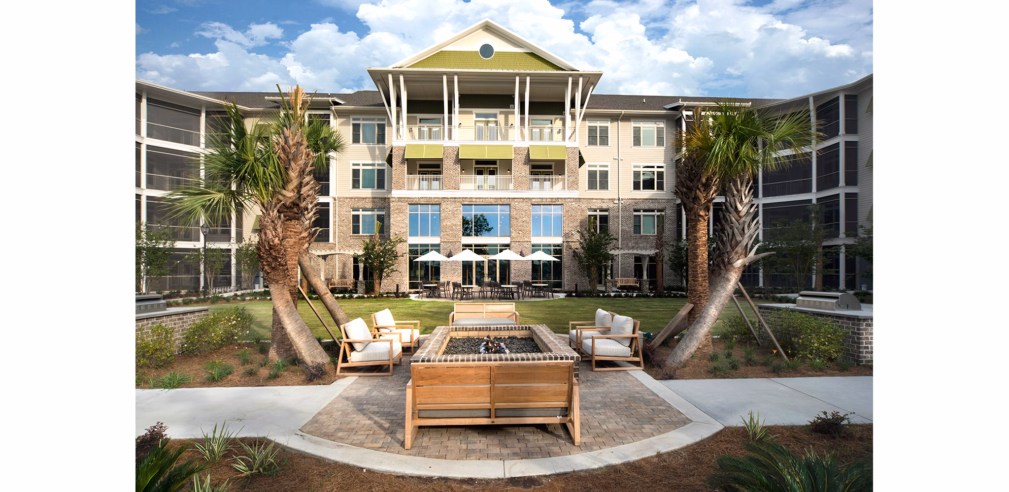 Relaxing outdoor fire pit area at WaterWalk apartments in Shelter Cove Towne Centre, perfect for cozy gatherings and evenings under the stars