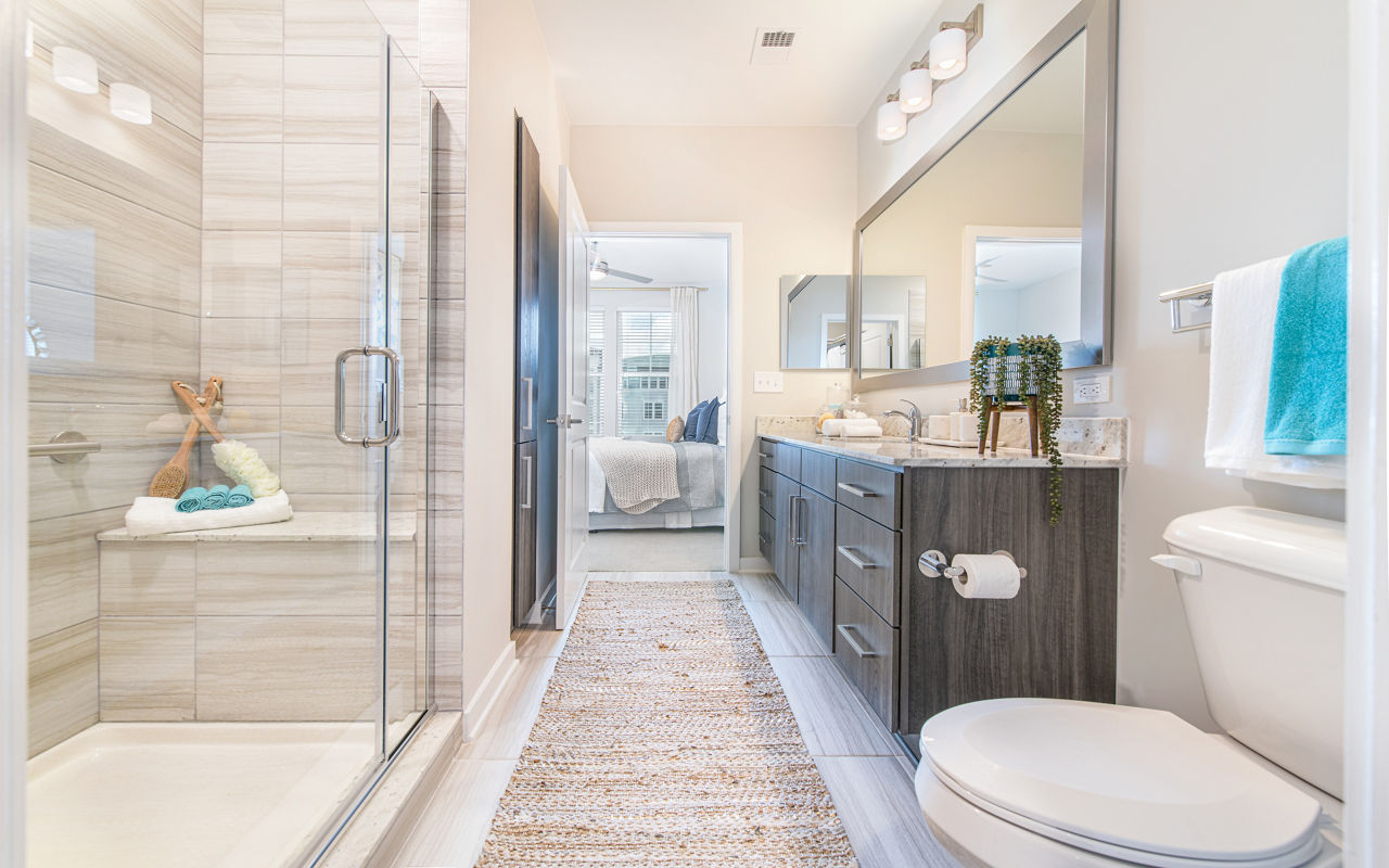 Modern bathroom with sleek finishes in Overture Daniel Island Apartments luxury units