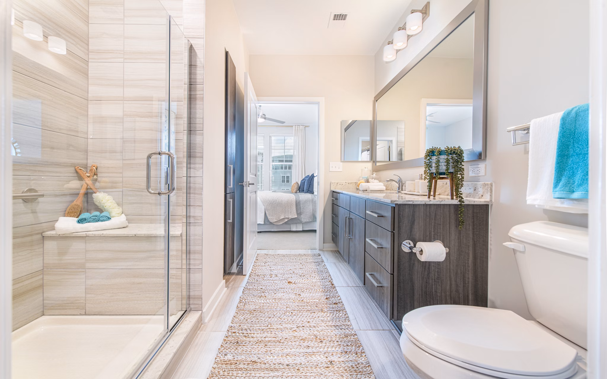 Modern bathroom with sleek finishes in Overture Daniel Island Apartments luxury units