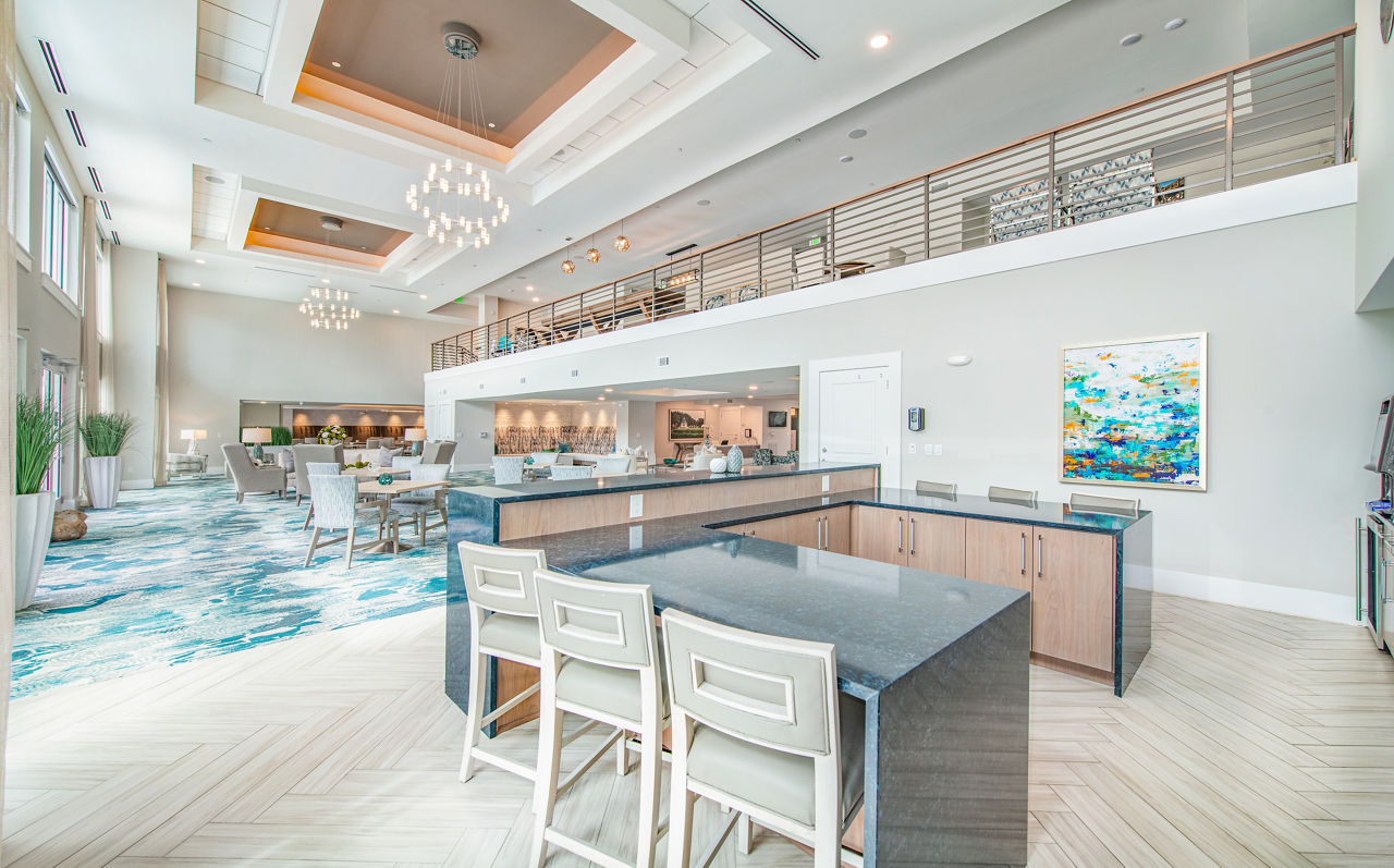 Clubhouse featuring modern design and spacious seating at Overture Daniel Island Apartments, luxury living in a vibrant community
