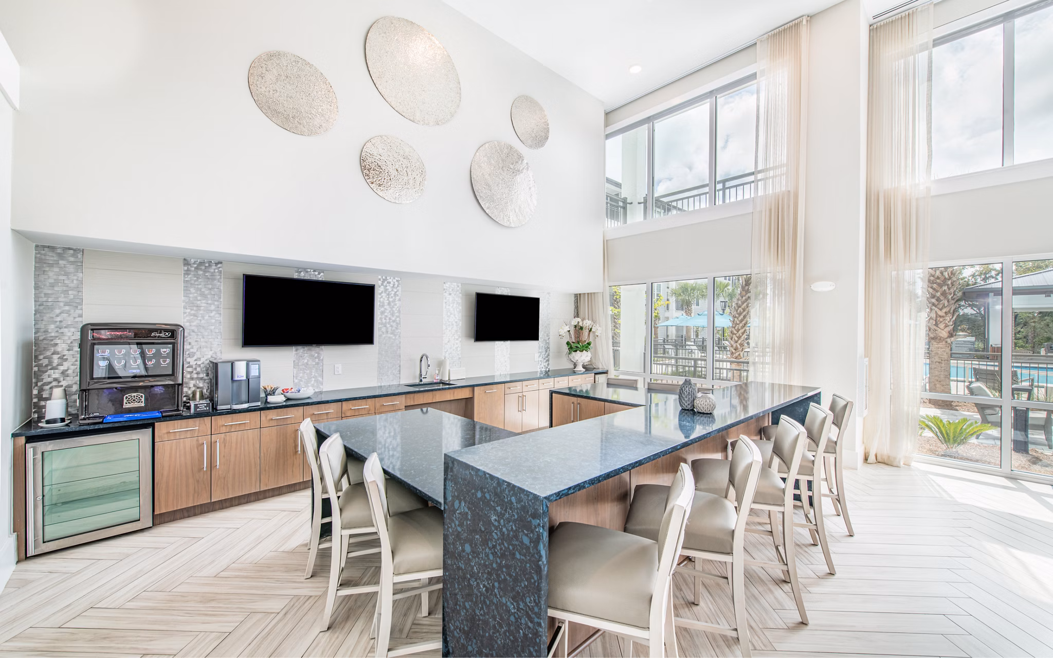 Clubhouse featuring modern design and cozy seating areas at Overture Daniel Island Apartments, offering luxury living in Charleston