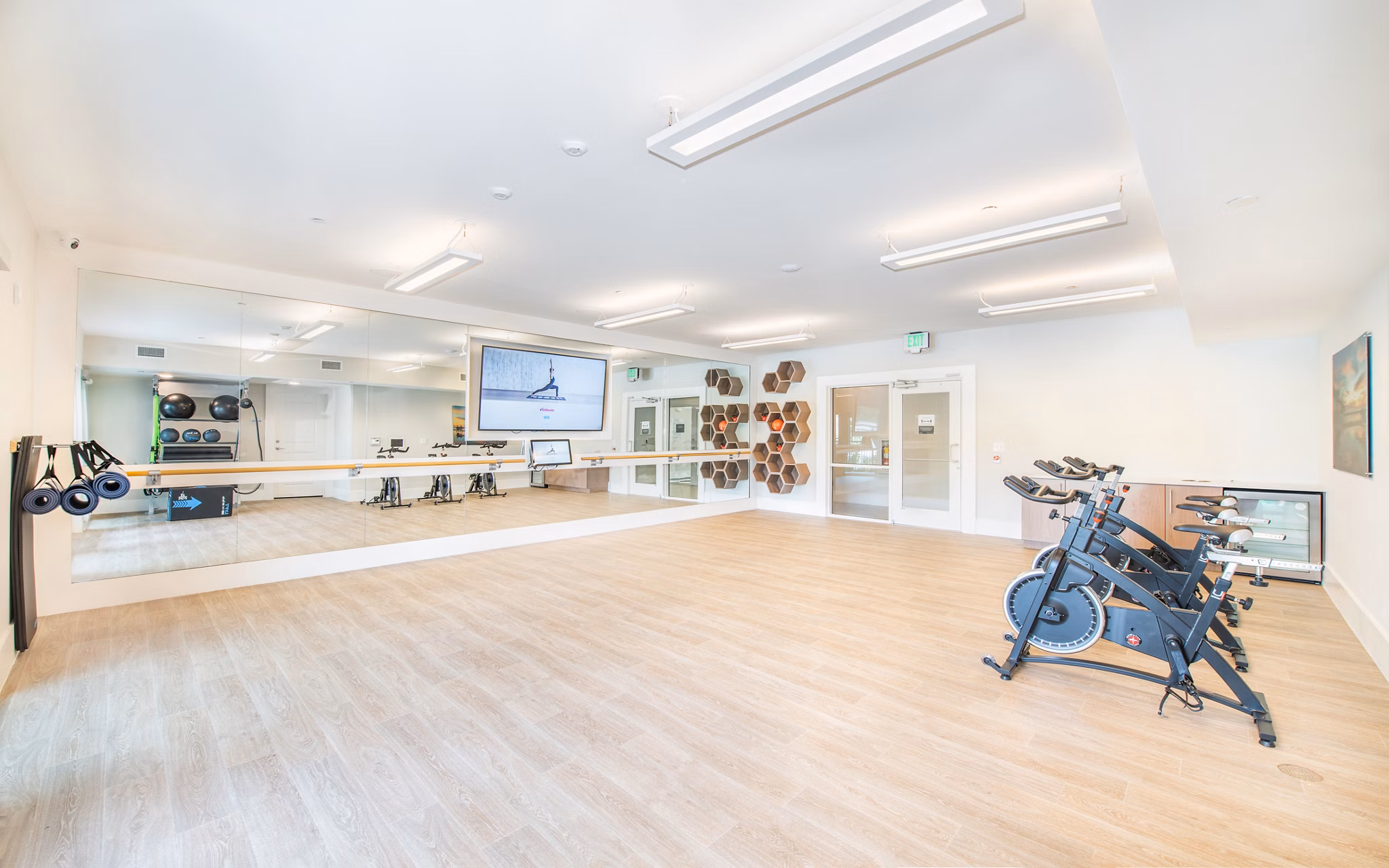 Yoga and spin studio with modern equipment at Overture Daniel Island Apartments