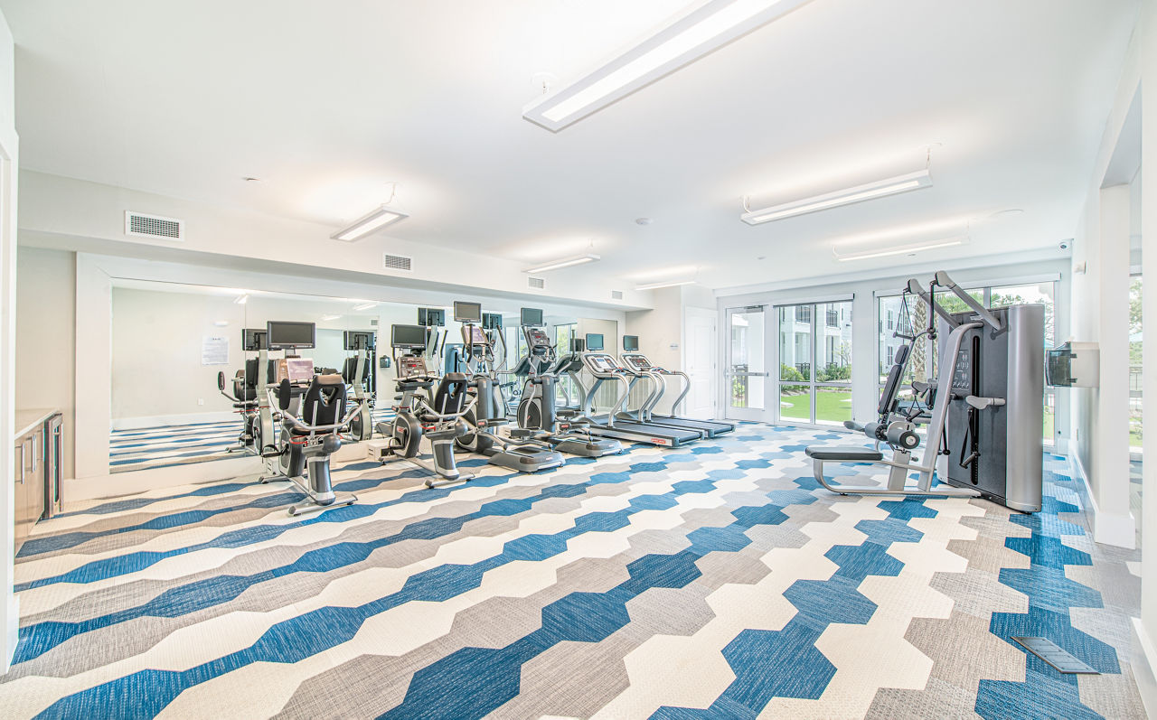 Modern fitness center with state-of-the-art equipment at Overture Daniel Island Apartments