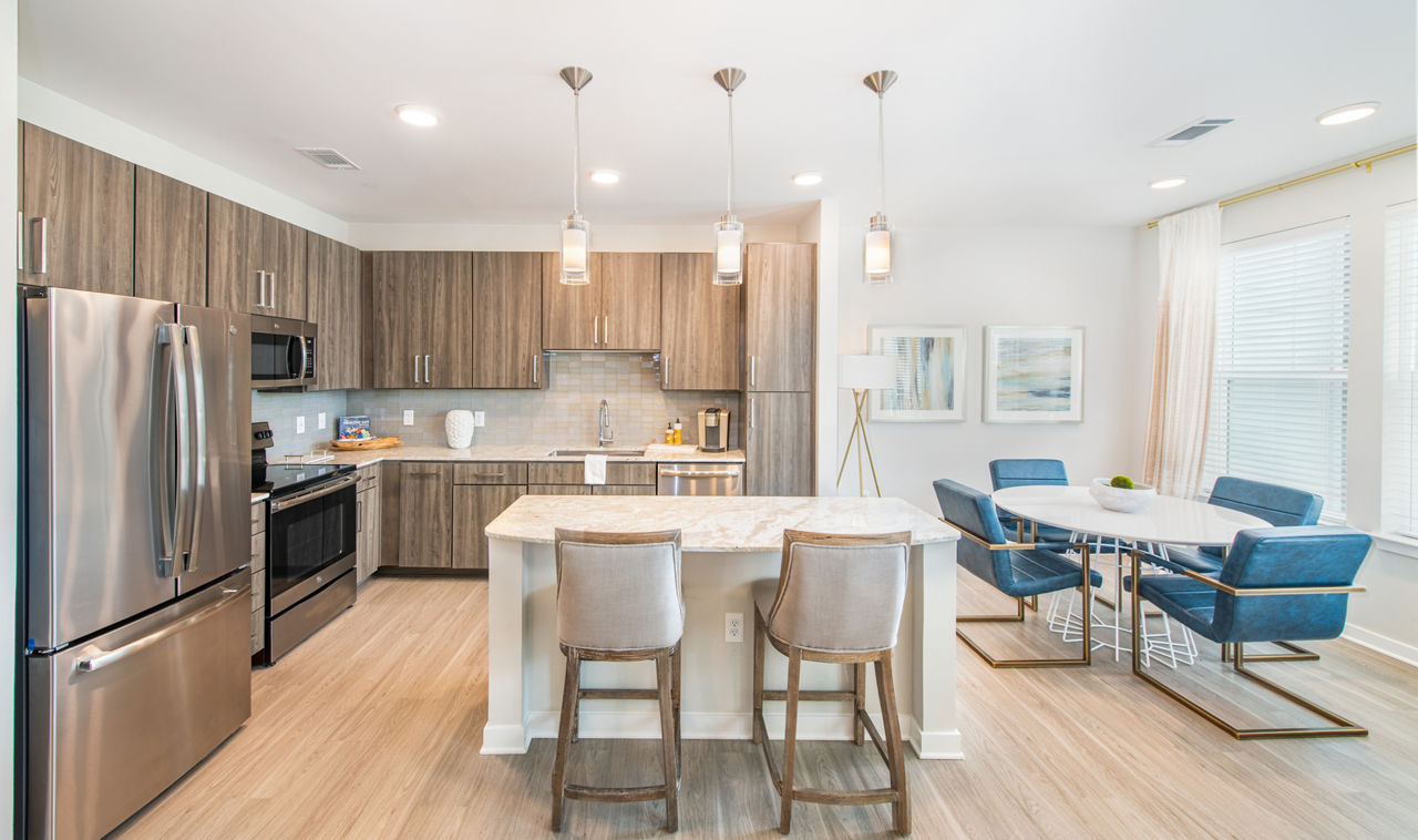 Modern kitchen with stainless steel appliances at Overture Daniel Island Apartments